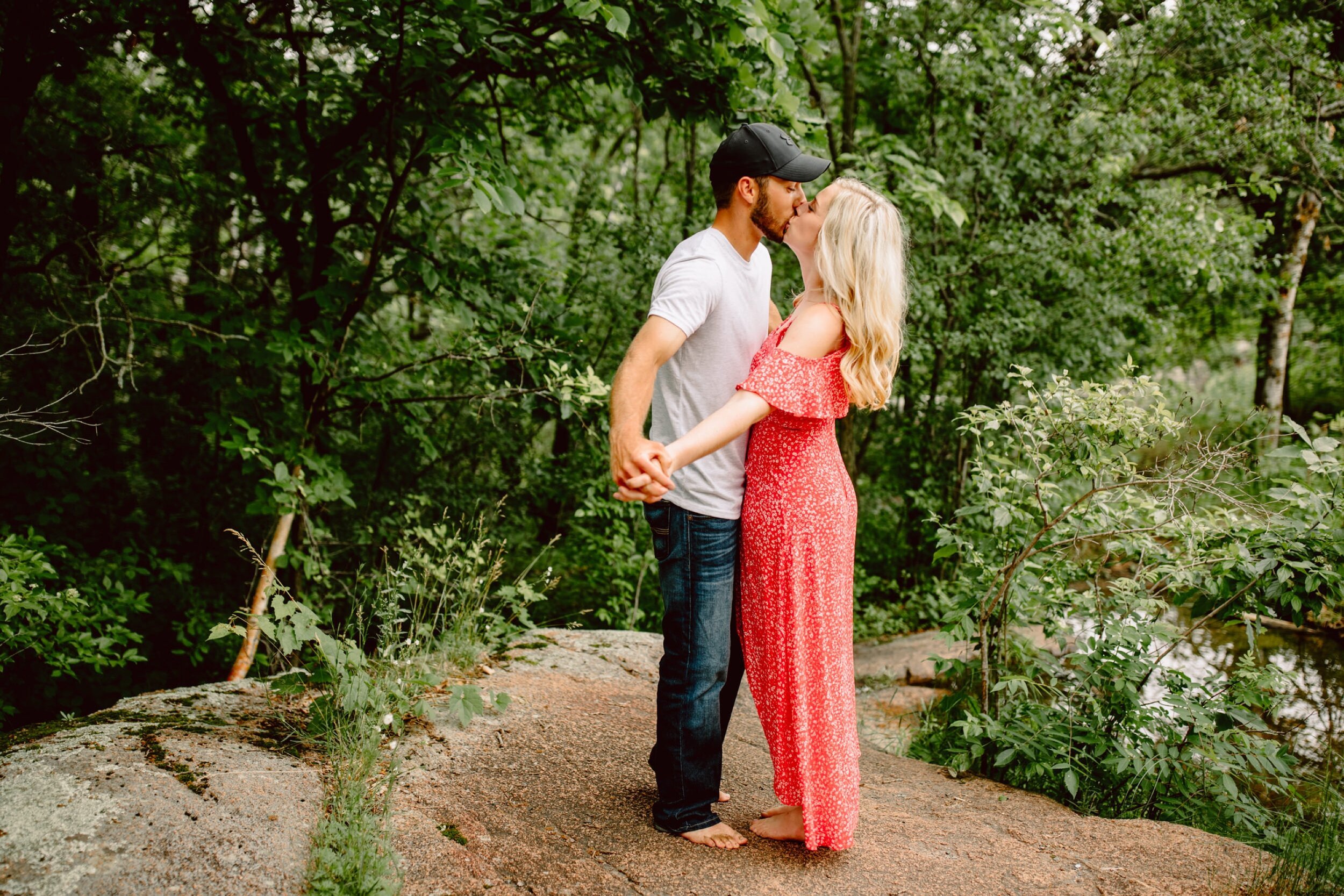 22_quarry-park-engagement-session-st-cloud-anika-nic-35_Engagement_tree_forest_water_quarry,_june.jpg