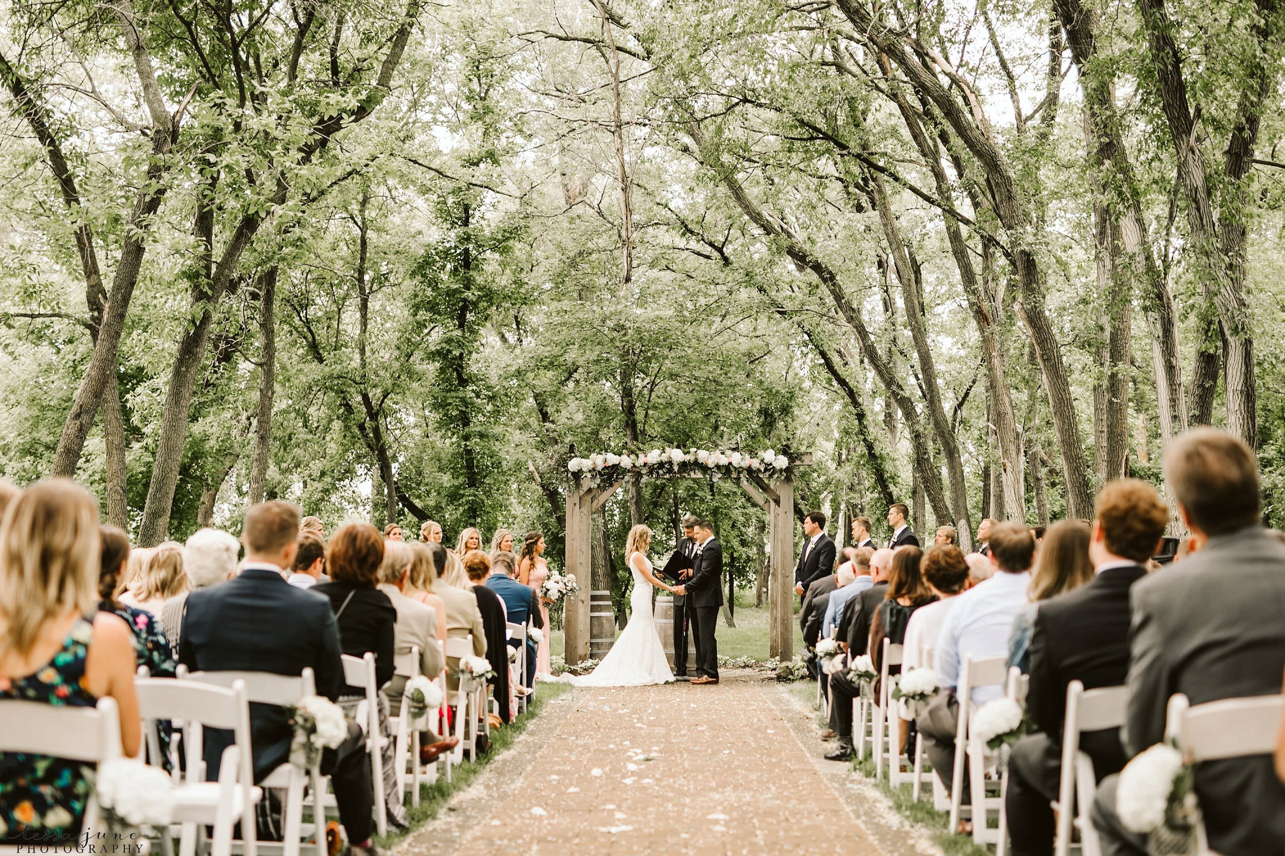 carlos-creek-winery-wedding-summer-pristine-floral-blush-pink-navy-alexandria-minnesota-109.jpg