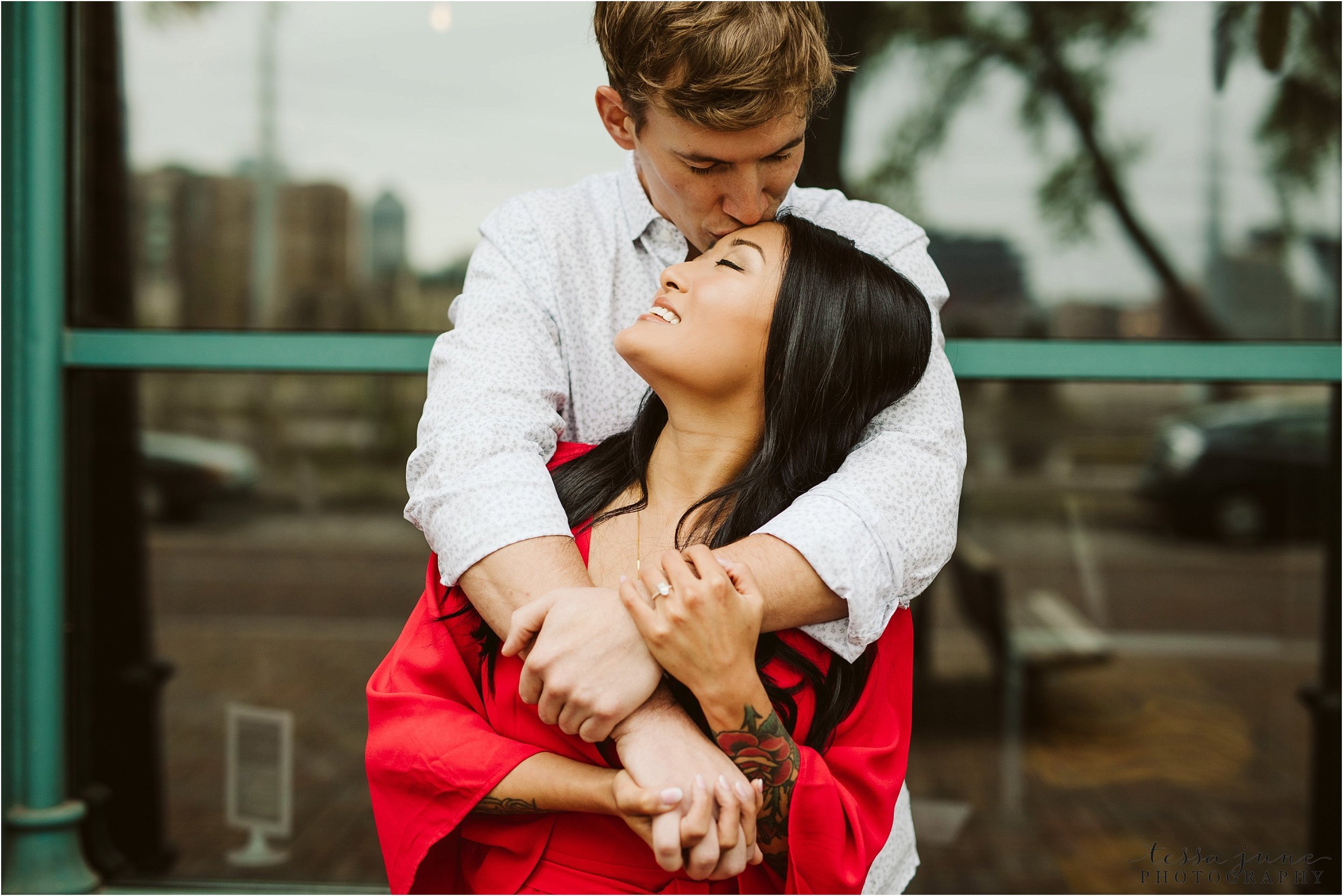 st-anthony-main-minneapolis-engagement-session-red-dress-9.jpg