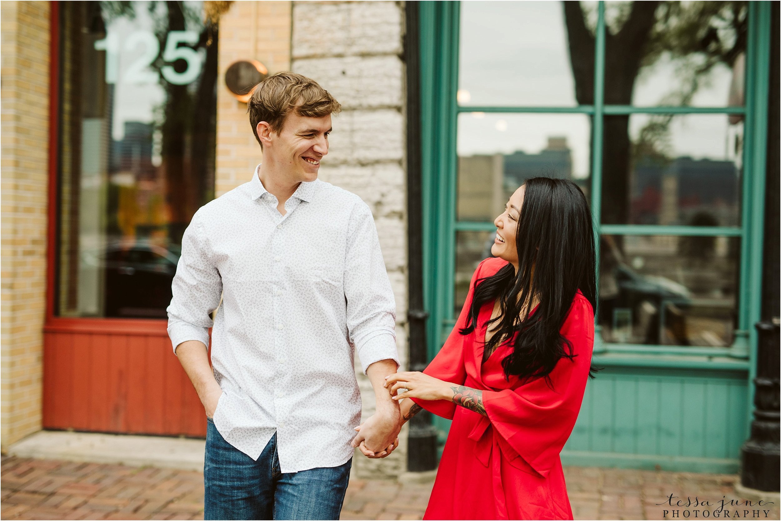 st-anthony-main-minneapolis-engagement-session-red-dress-13.jpg