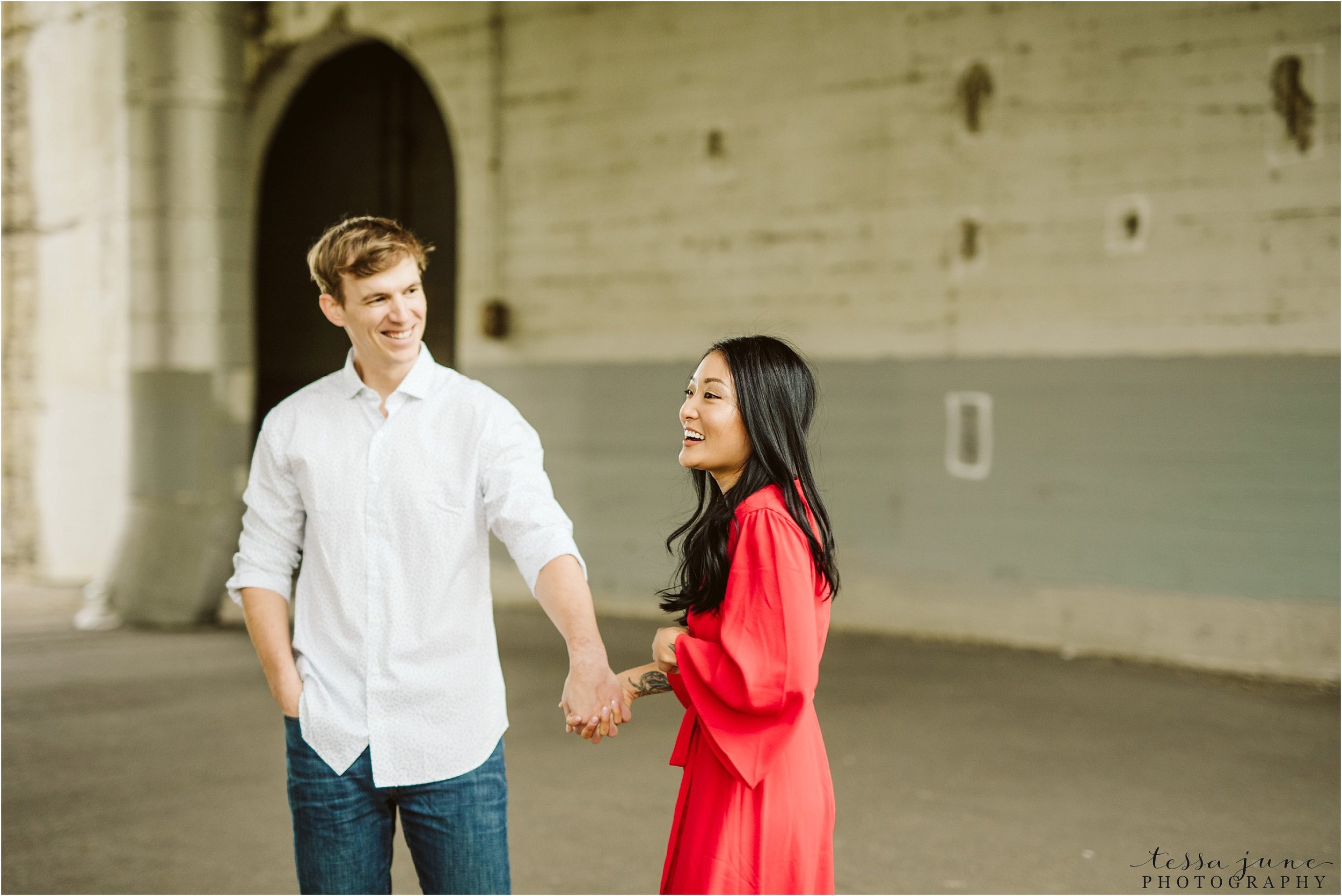 st-anthony-main-minneapolis-engagement-session-red-dress-19.jpg