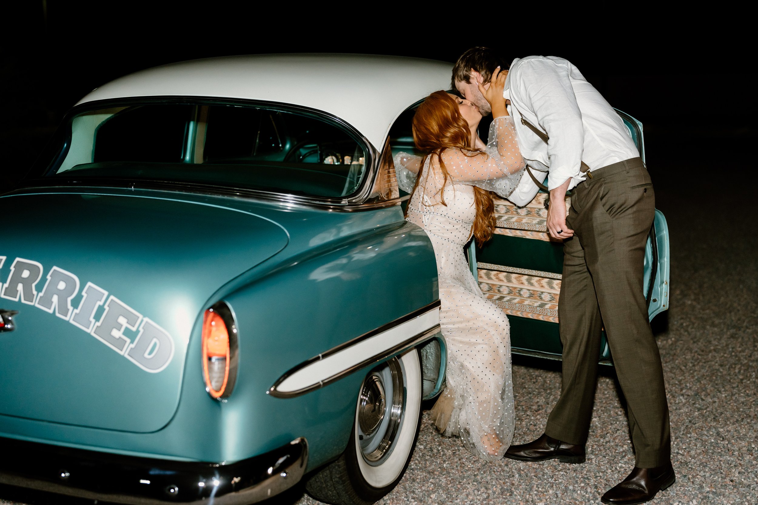 The Paseo Venue wedding exit with a vintage car