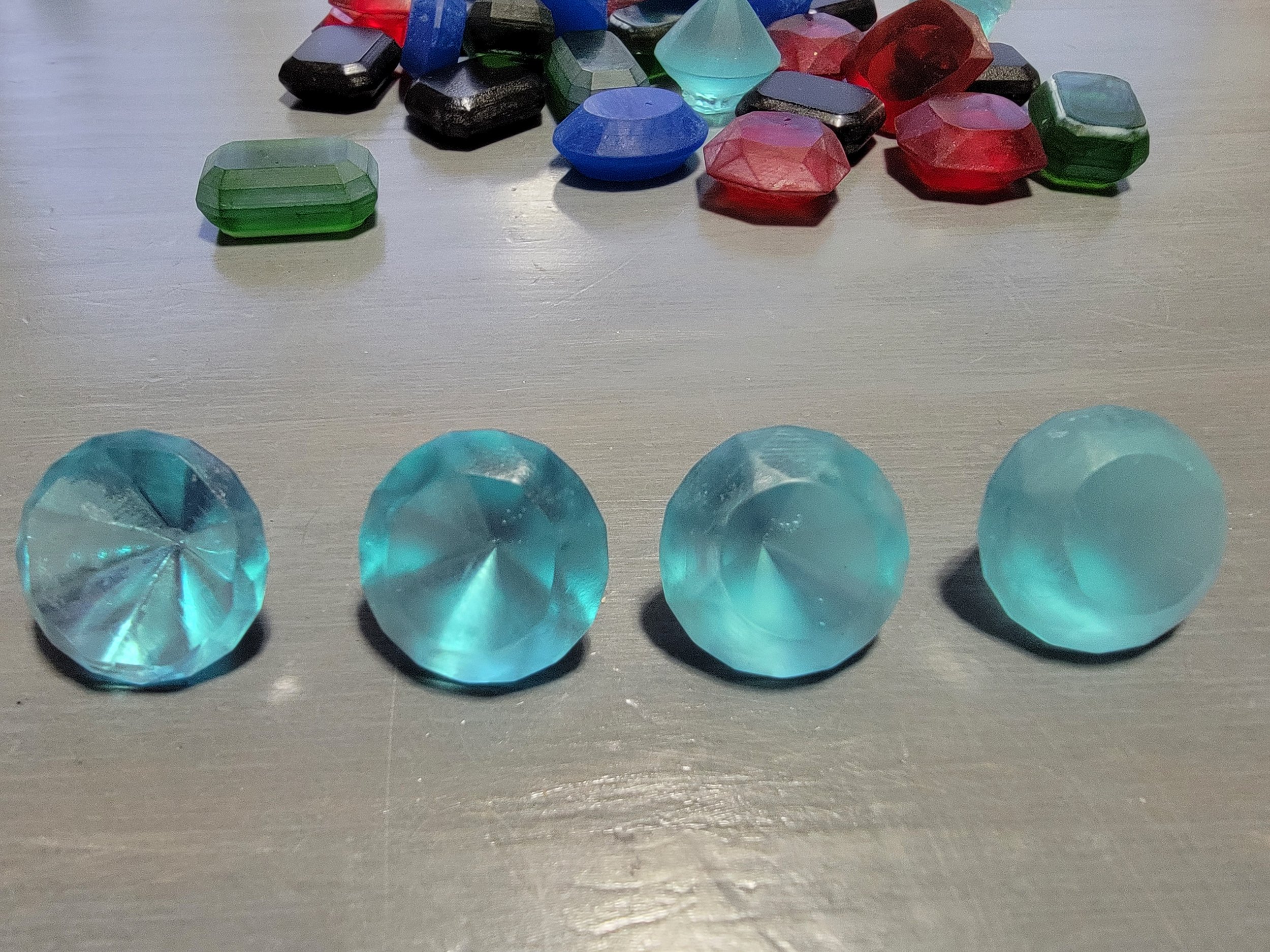 Second thing I looked at was the post processing of the gems. They are positioned in clarity Left to right 1- Sanded and Gloss clear coat 2-lightly Sanded and Satin clear coat 3-sanded to polished and oiled 4-natural