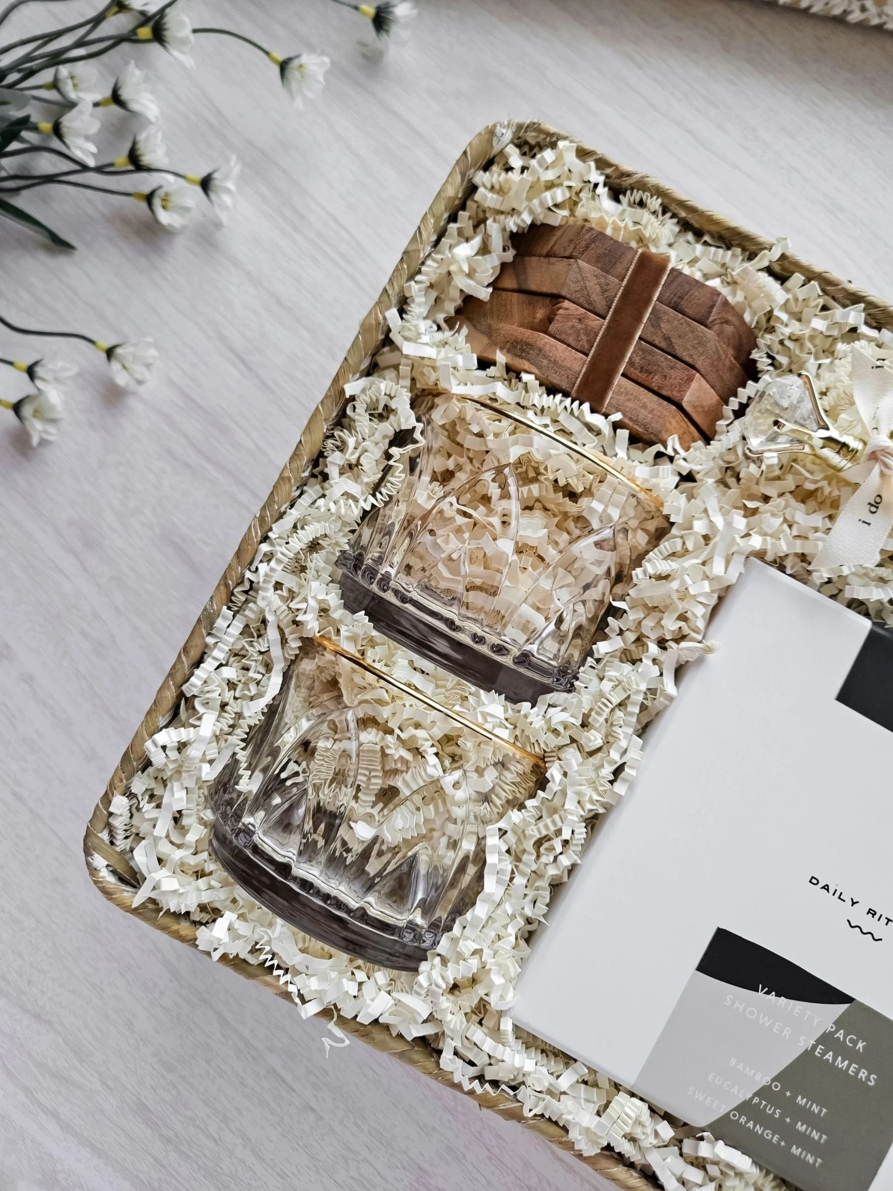 Sophisticated wedding gift basket with stylish glassware and modern wedding‑day touches, curated to celebrate the beauty of saying “I do.”