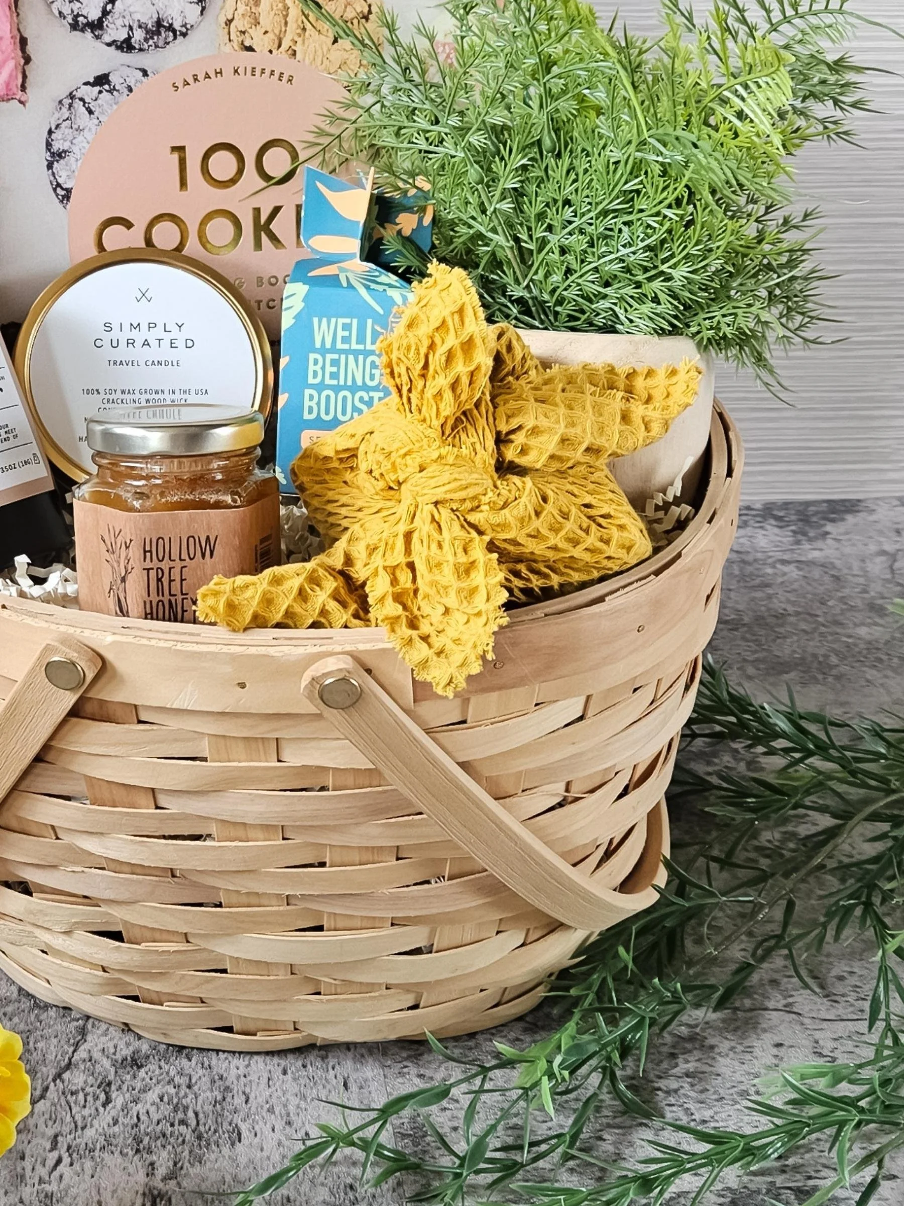 gorgeous spring gift basket for her with tea, honey, seeds, and more—ideal for garden or baking enthusiasts