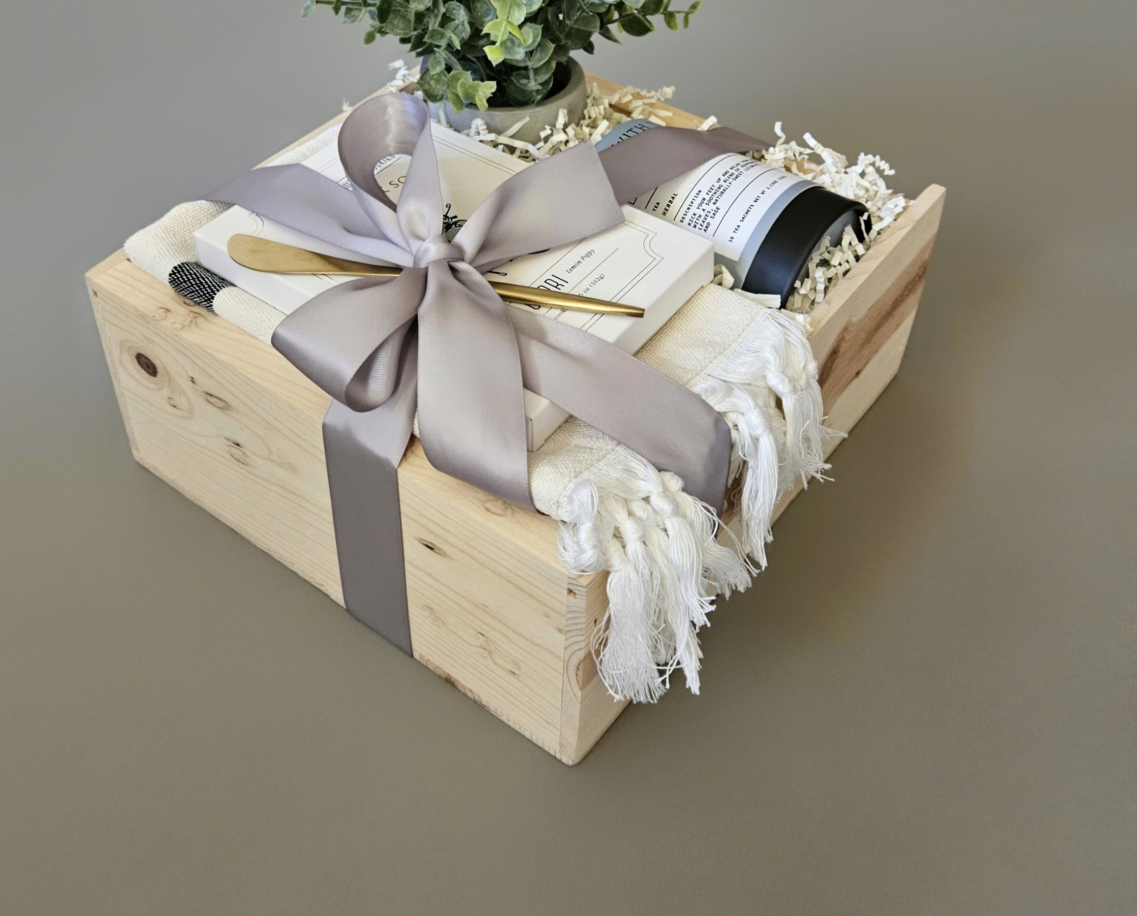 a gift for a new homeowner complete with delicious treats and beautiful accents