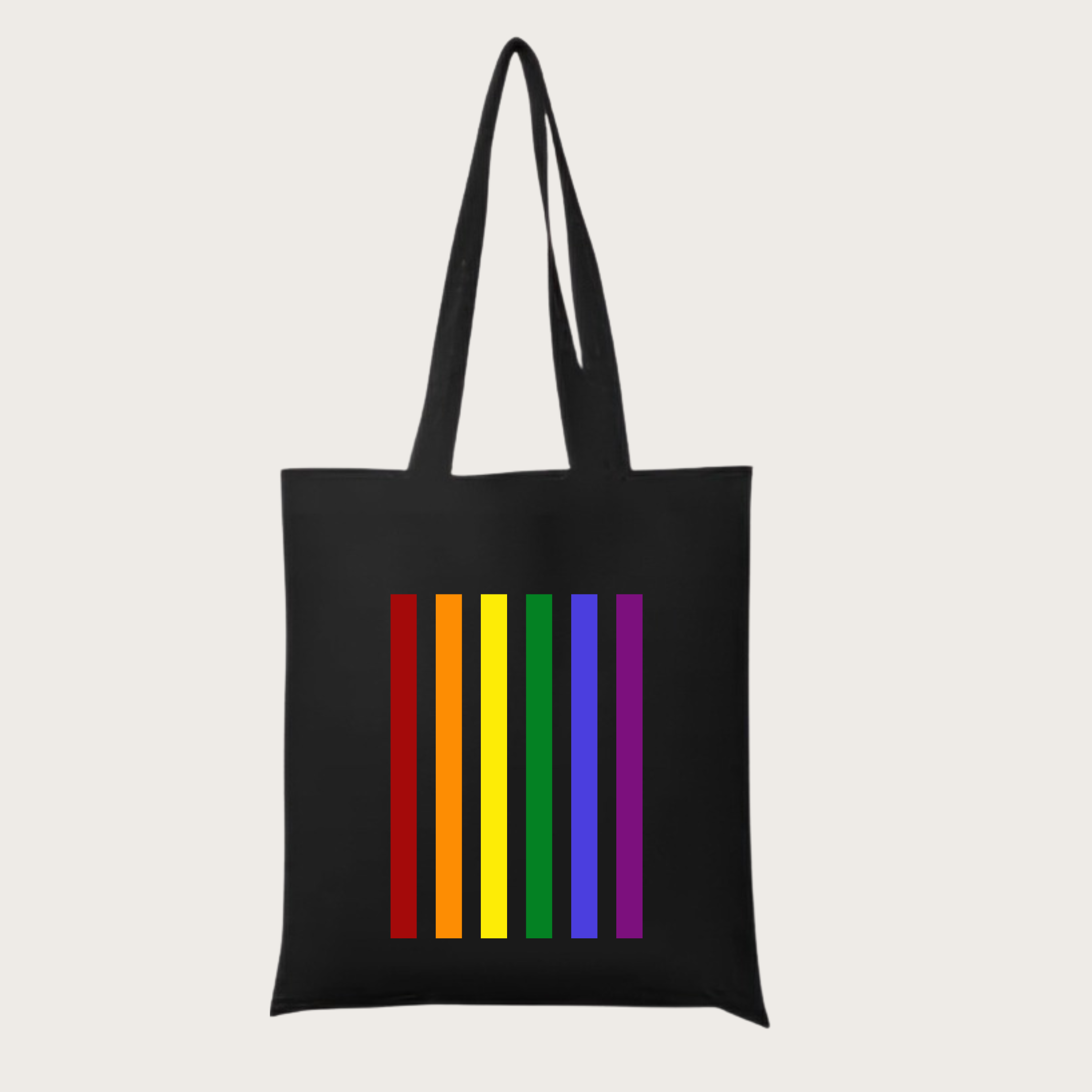 Black eco‑friendly tote bag with bold vertical rainbow stripes, celebrating LGBTQ+ Pride, equality, and inclusion.