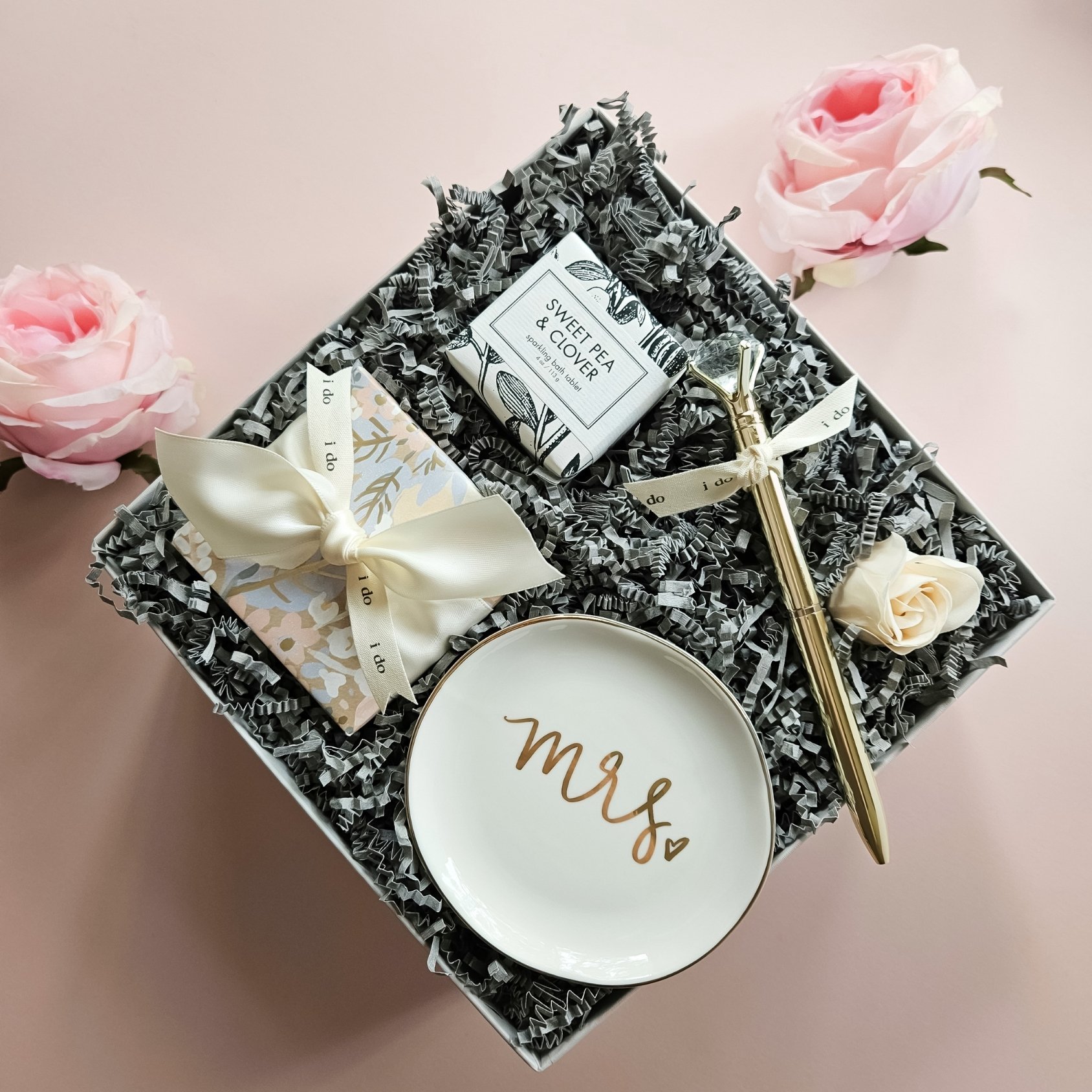 Beautifully packaged bridal box with luxurious details, designed to celebrate her journey from "Ms." to “Mrs.”