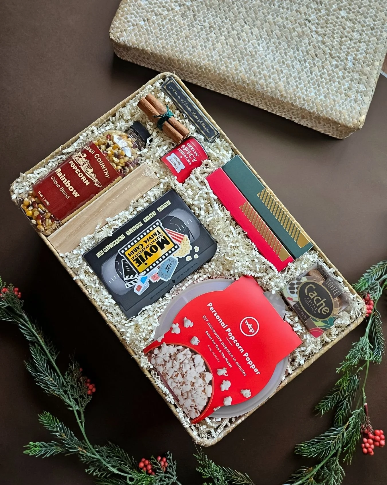 Luxury gourmet holiday gift box inspired by movie nights, games, and festive family traditions.