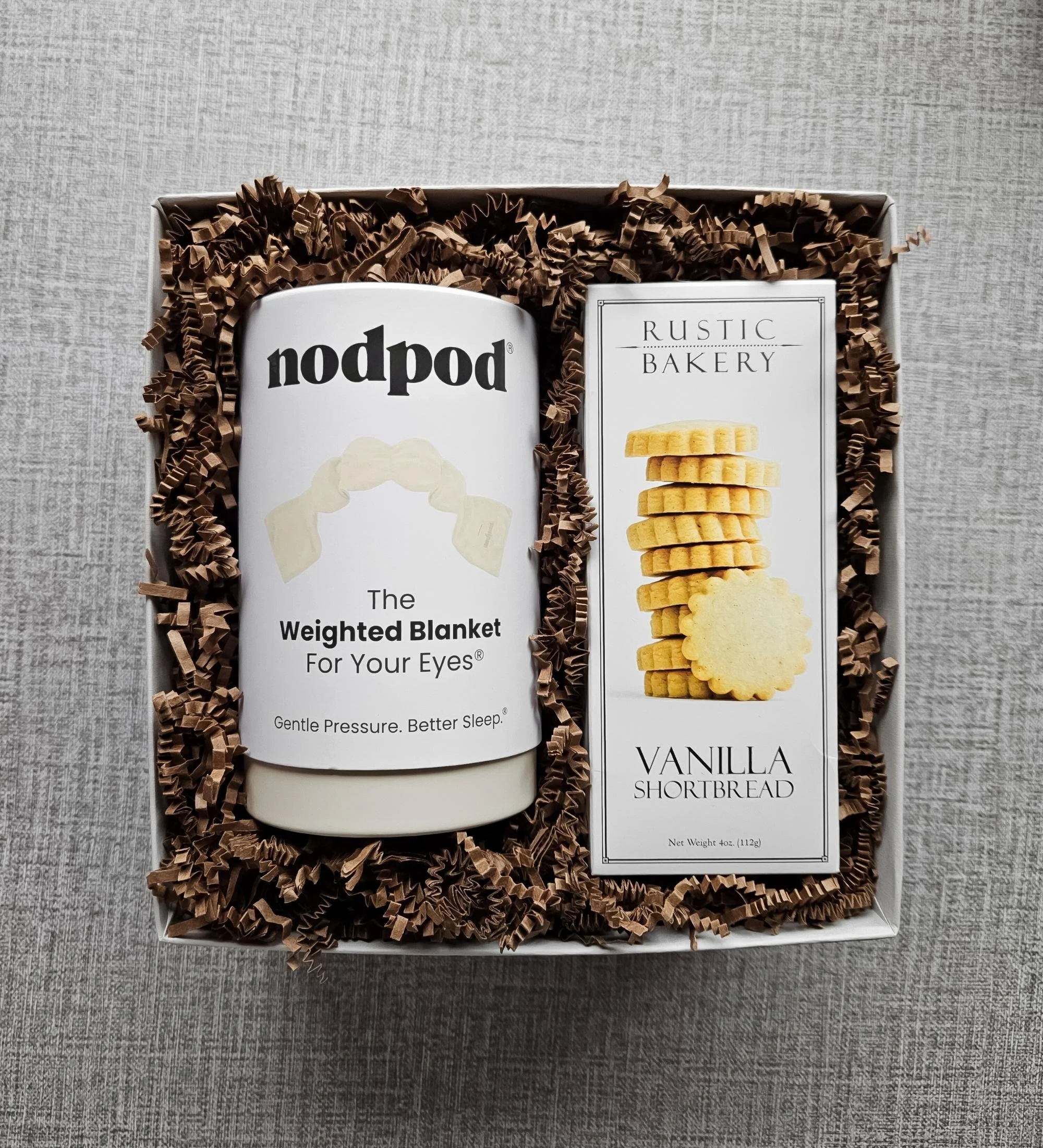 Luxury Linen Retreat gift box with weighted Nodpod eye mask and gourmet vanilla shortbread cookies, curated for relaxation and thoughtful gifting.