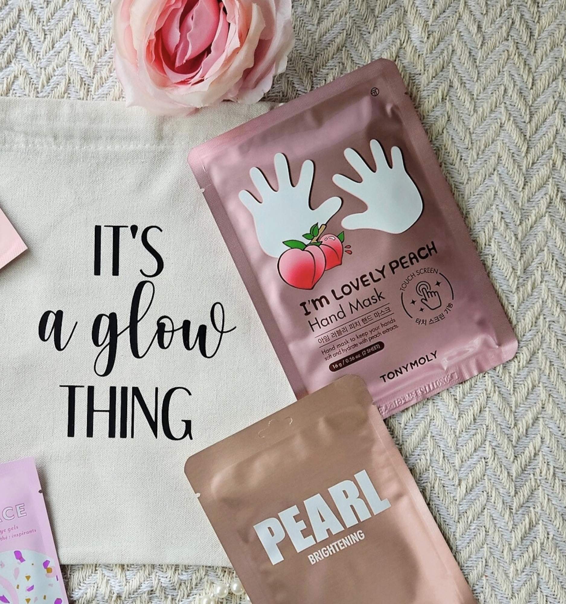 “It’s a Glow Thing” self‑care gift bag with sheet masks and pampering skincare essentials in a reusable cotton bag.