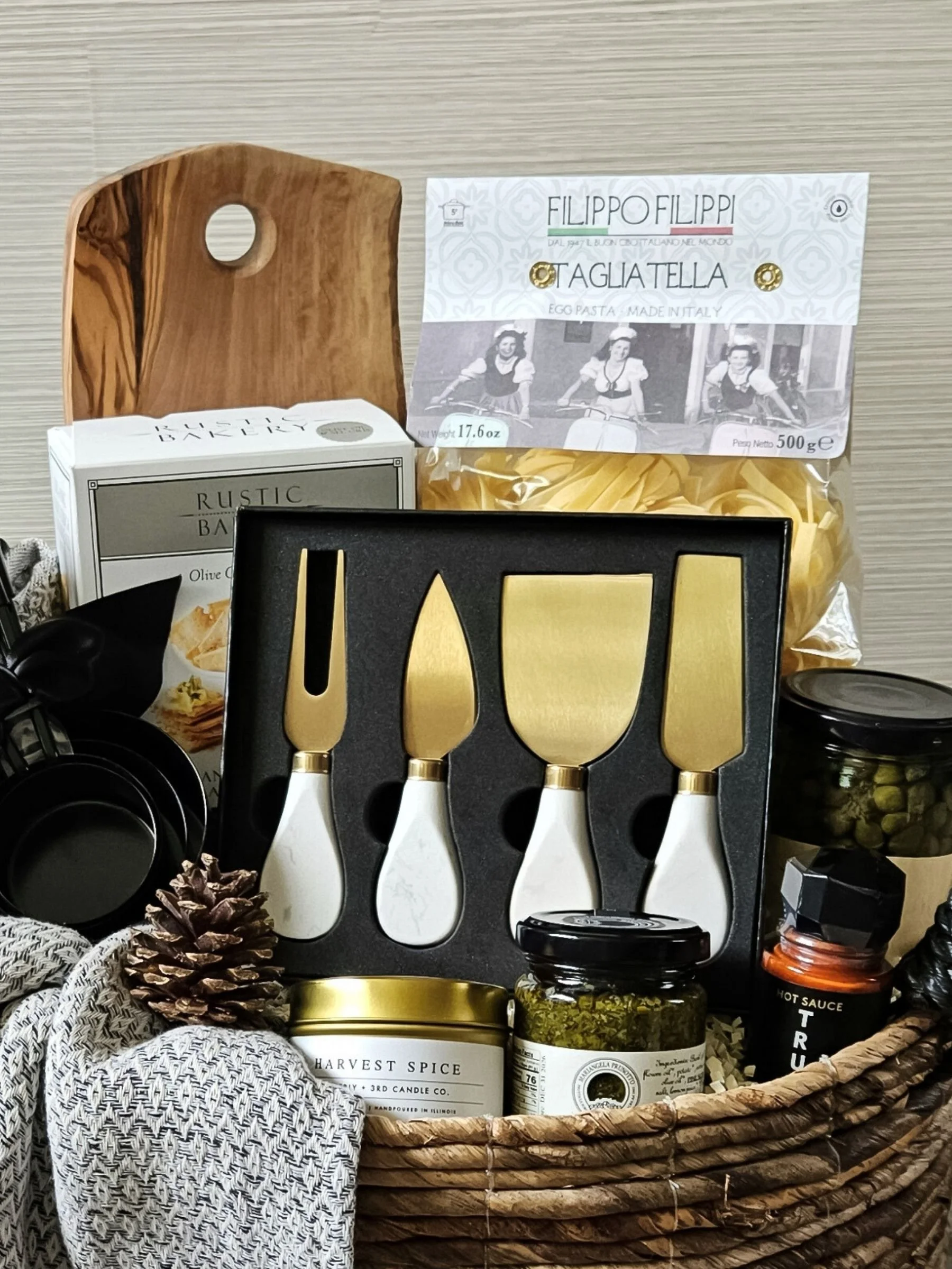 Gourmet Pasta Night gift basket with Italian pasta, basil pesto, olive oil crackers, and marble‑gold cheese knives for an elevated culinary gift.