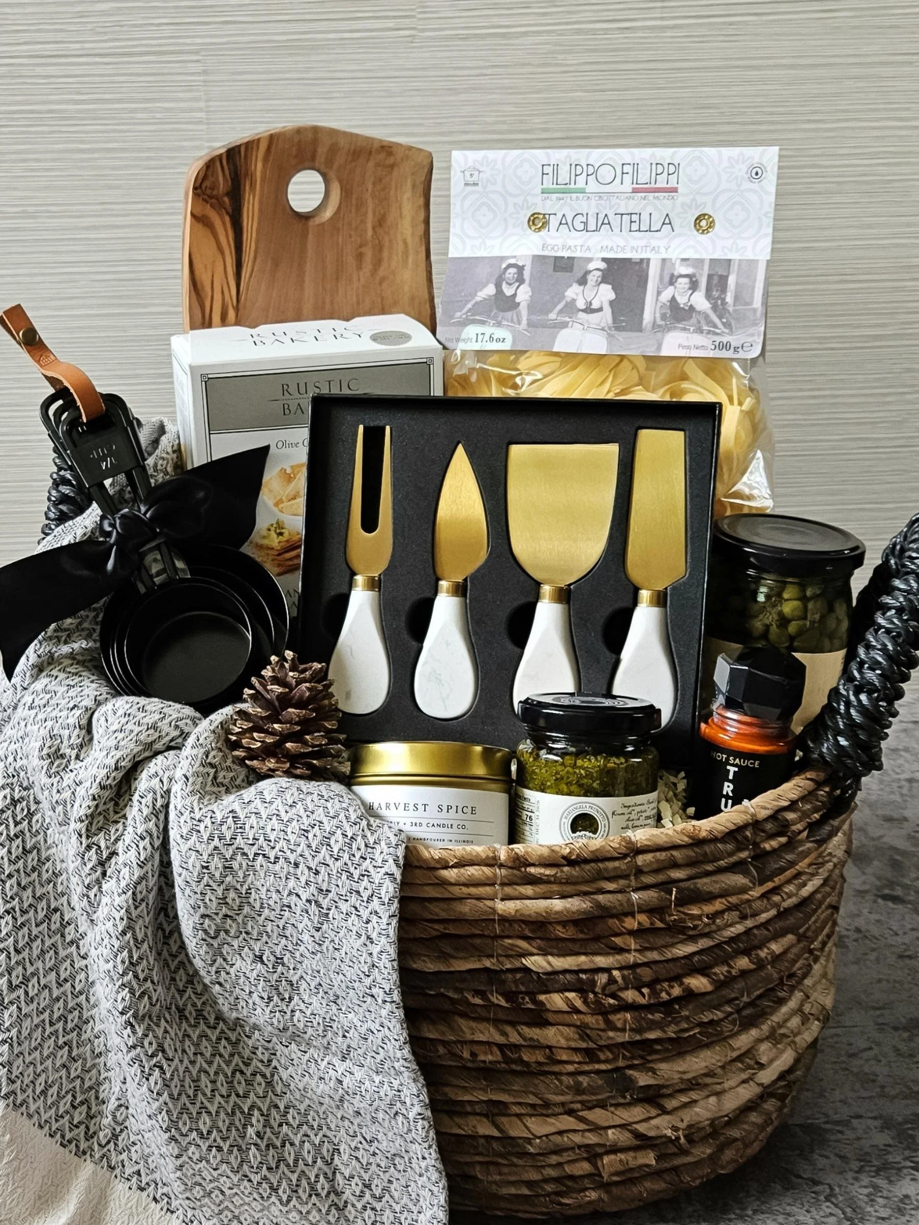 Modern Pasta Night gift basket featuring premium pasta, rich pesto, olive oil crackers, and luxe marble cheese knives for refined food lovers.