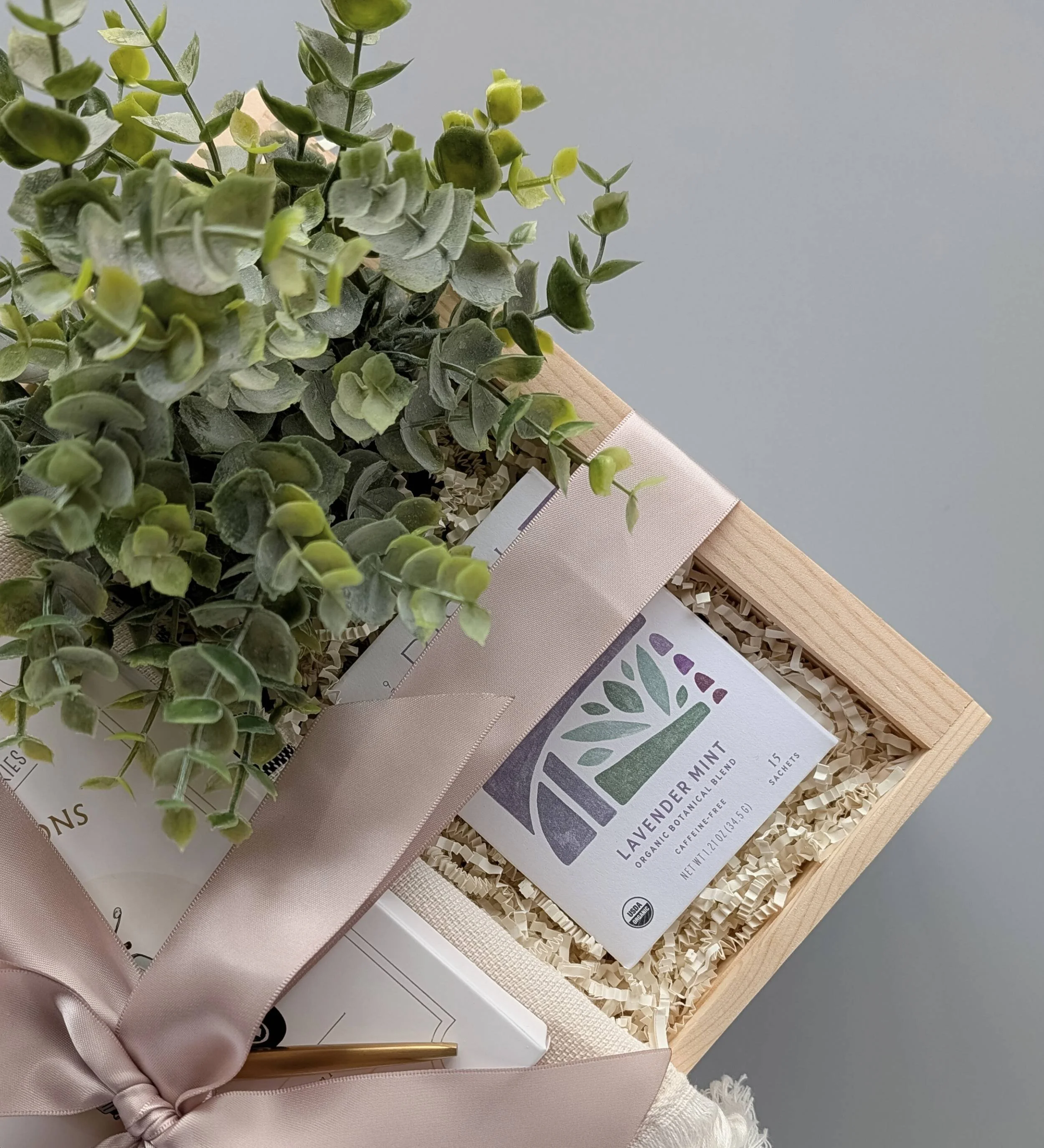 Curated Tea Time gift basket featuring premium tea, gourmet lemon poppy shortbread cookies, and soft turkish hand towel for new homeowners