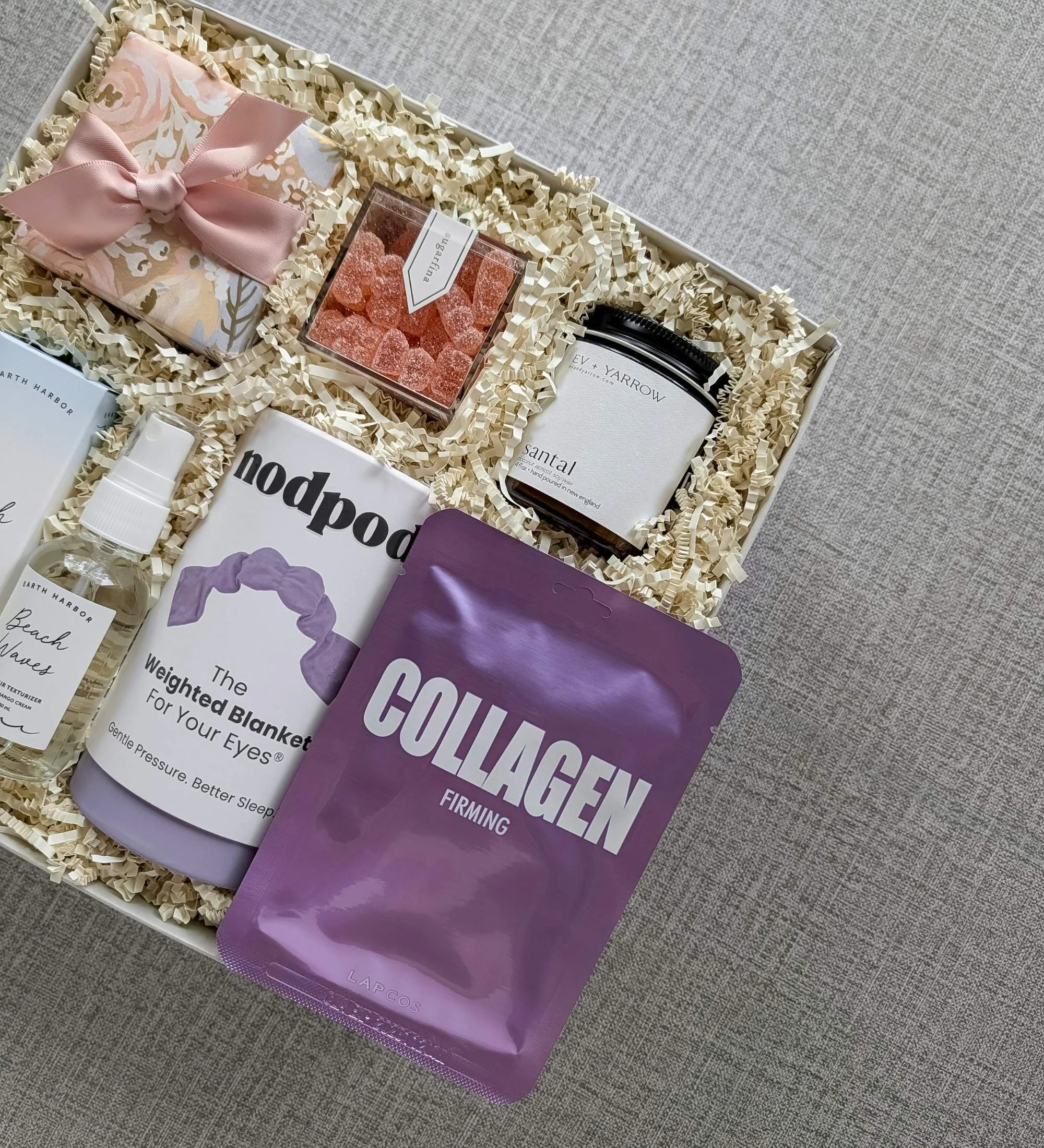 Relaxation gift box for weddings, Mother’s Day, and thank‑yous with candle, beach spray, weighted mask, sheet mask, gummies, and eye patches.