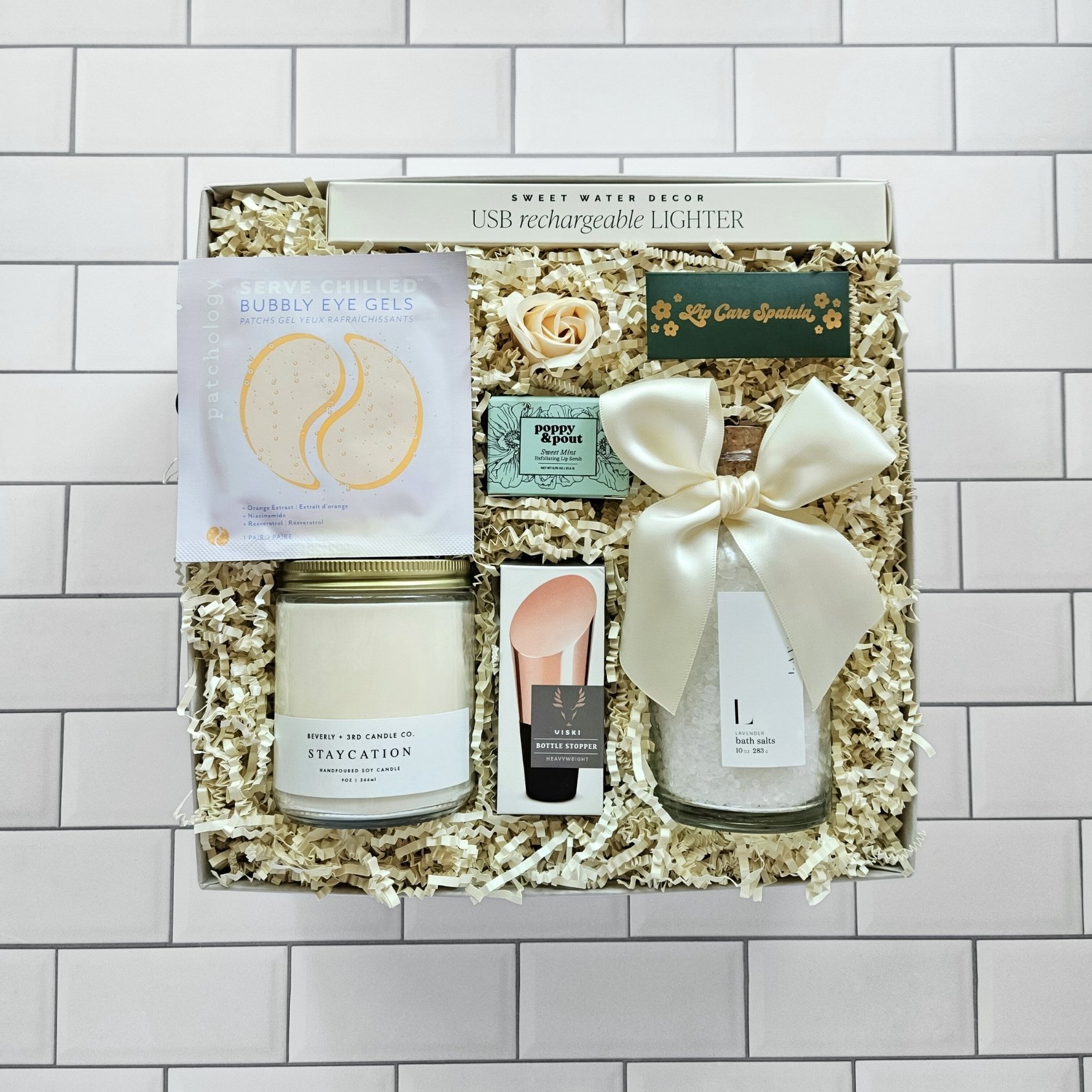Ultimate spa gift box with lavender salts, lip scrub, eye gels, candle, and more. Perfect for birthdays, anniversaries, or bridal shower gifts.