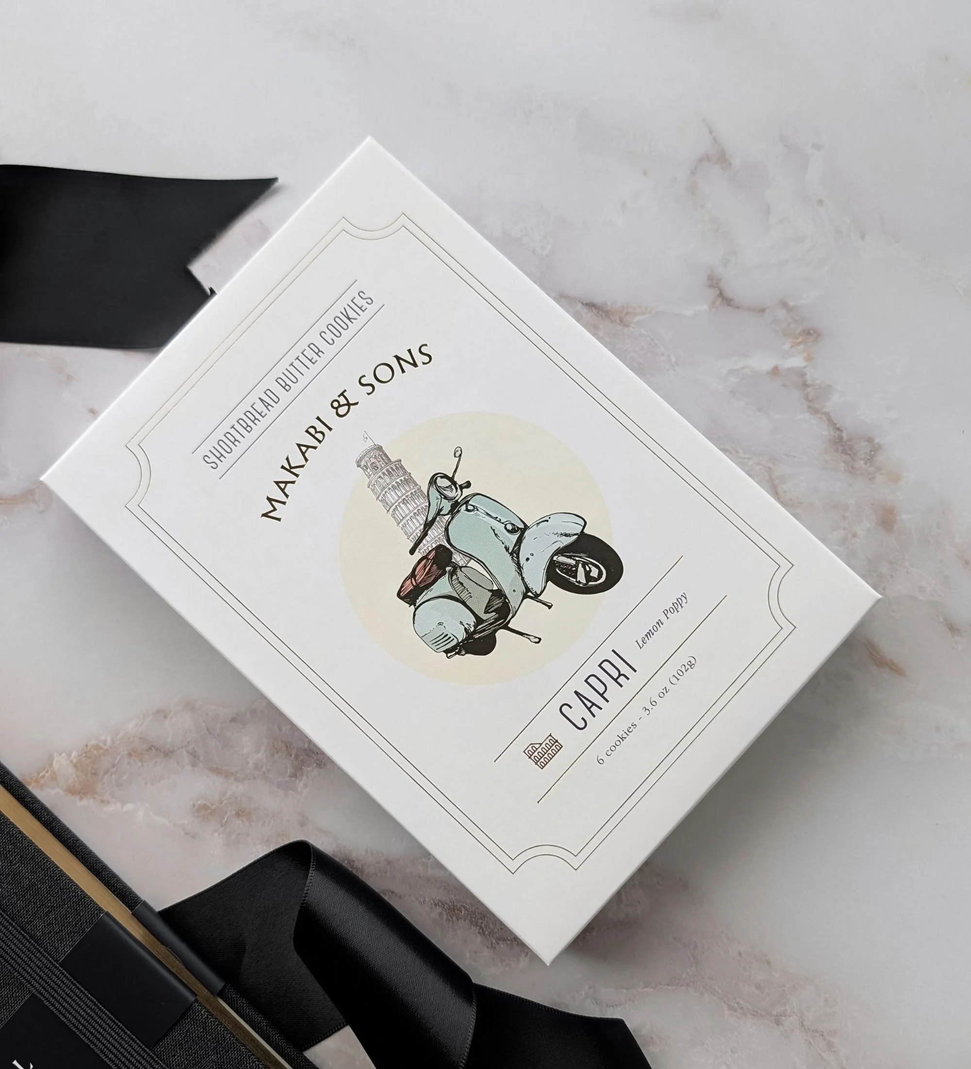 Makabi & Sons Capri lemon poppy shortbread cookies from The Ledger gift box, bright citrus shortbread in premium artisan packaging.