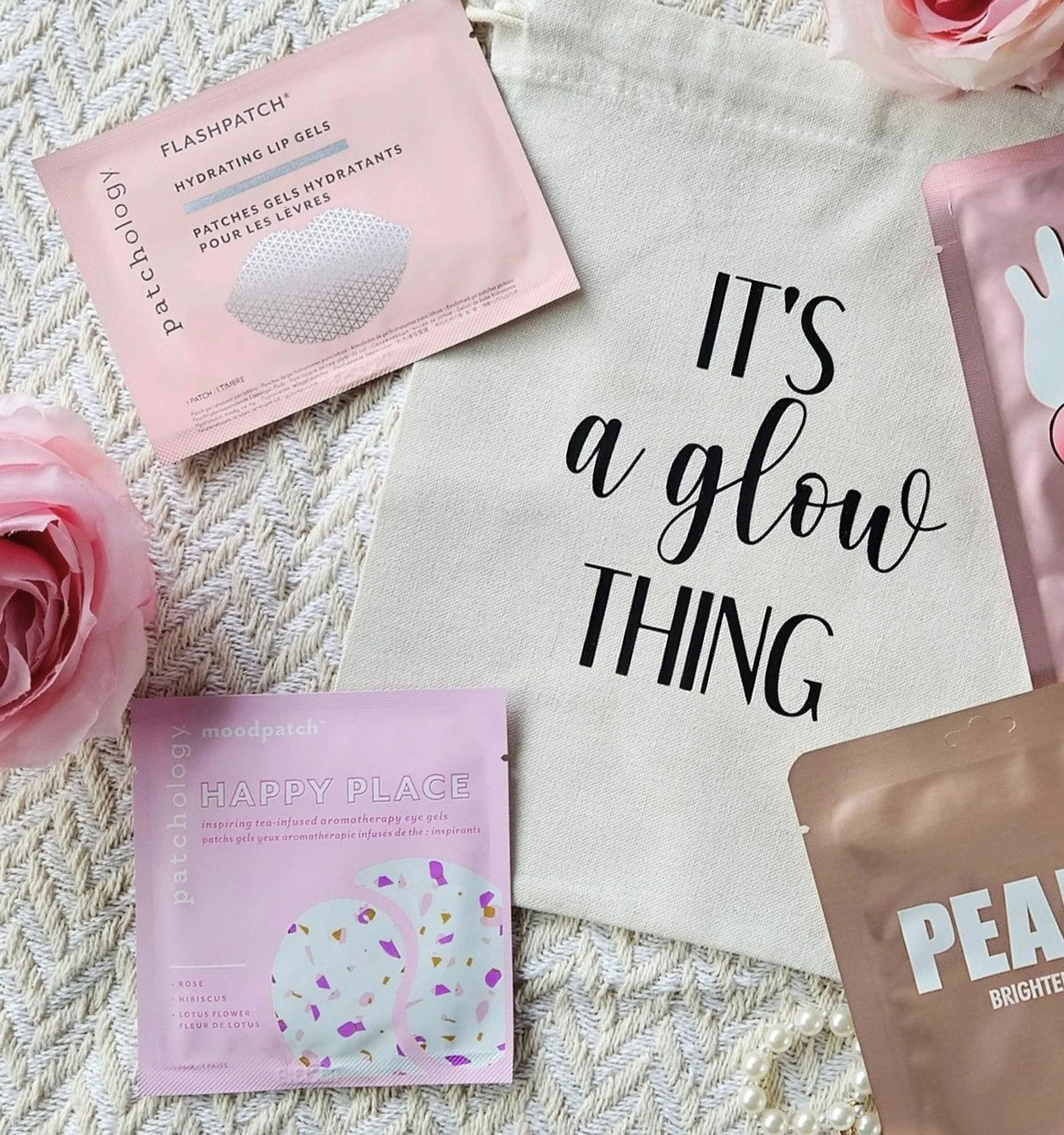 Reusable cotton self‑care gift bag packed with hydrating sheet masks designed to refresh and rejuvenate skin.