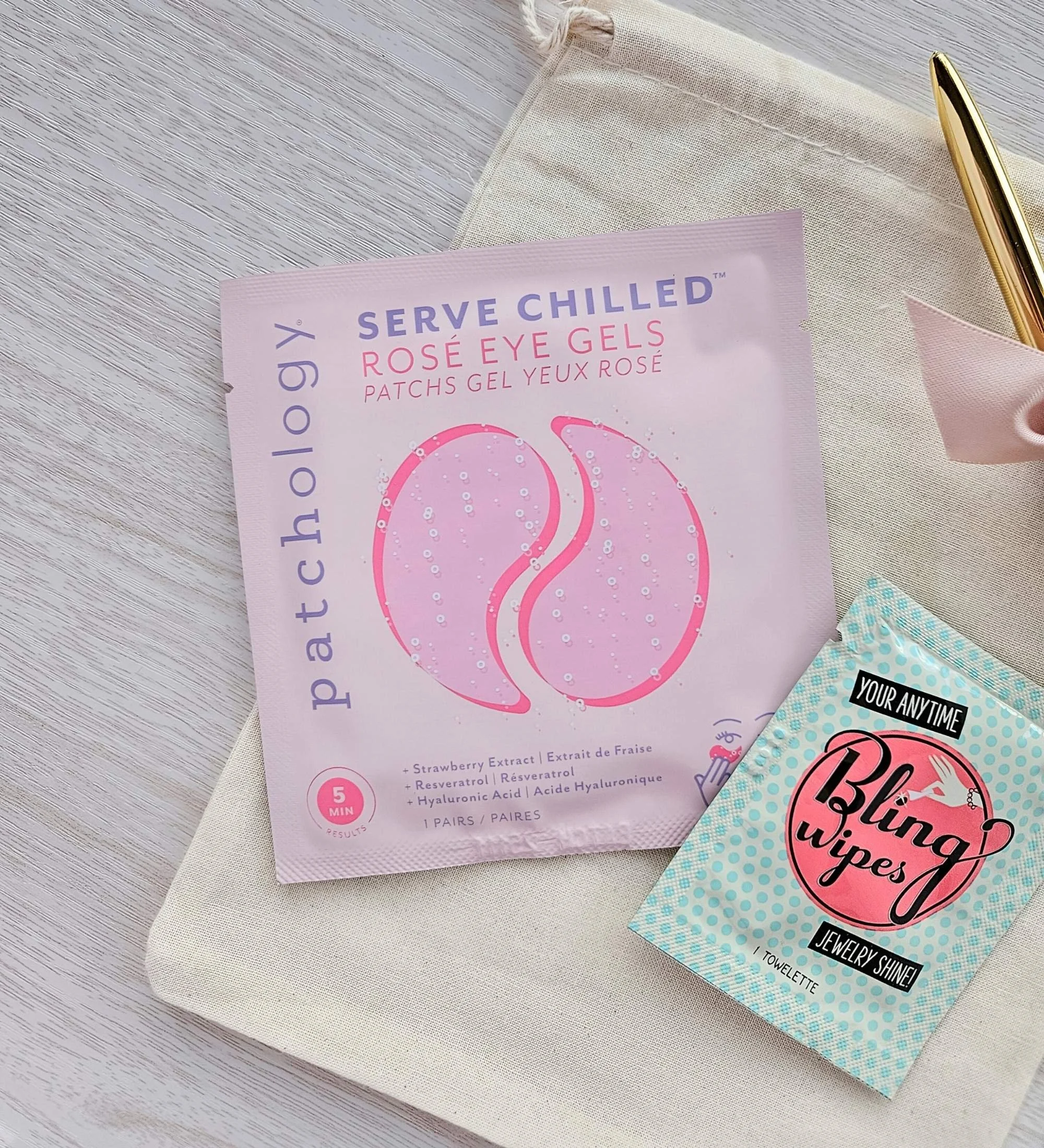 Served Chilled Rosé eye gels displayed on the cotton bridal bag for the Mini “I Do” gift.
