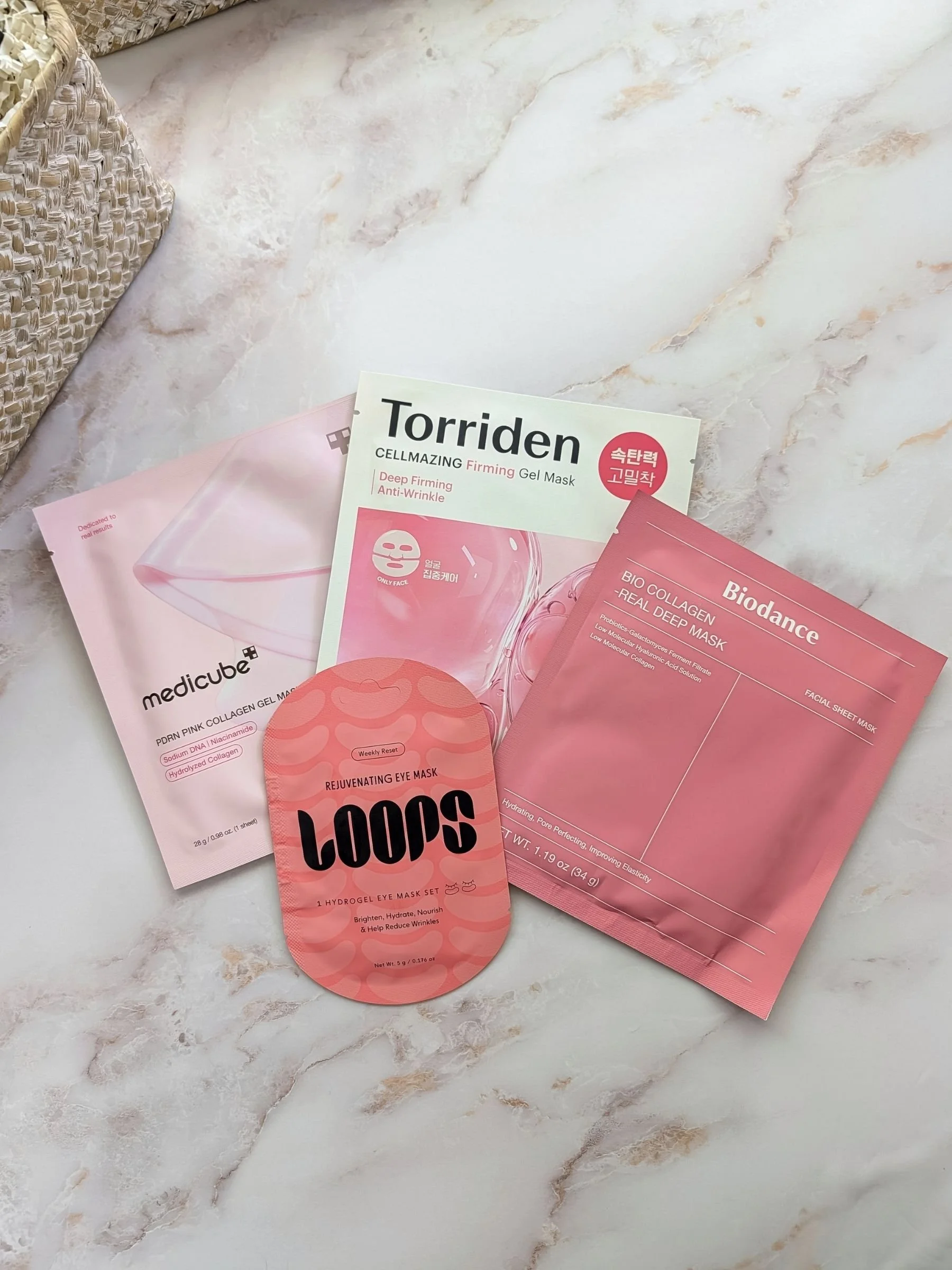 Set of four collagen, firming, and revitalizing masks for face, eyes, and lip from Biodance, skin1004, torriden, and loops.