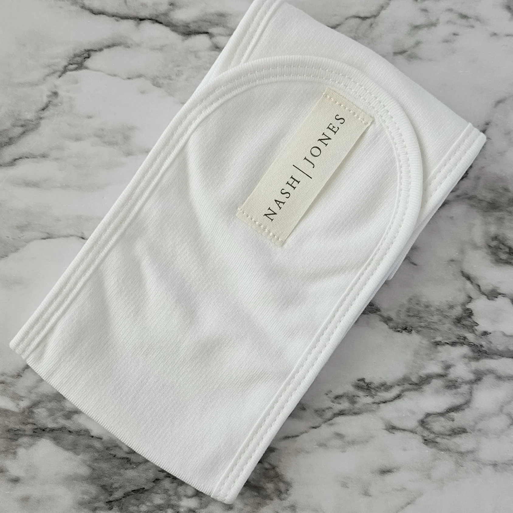 Luxury bamboo headband ideal for skincare routines, spa days, lounging, or everyday rituals. Eco-friendly gift ideas.