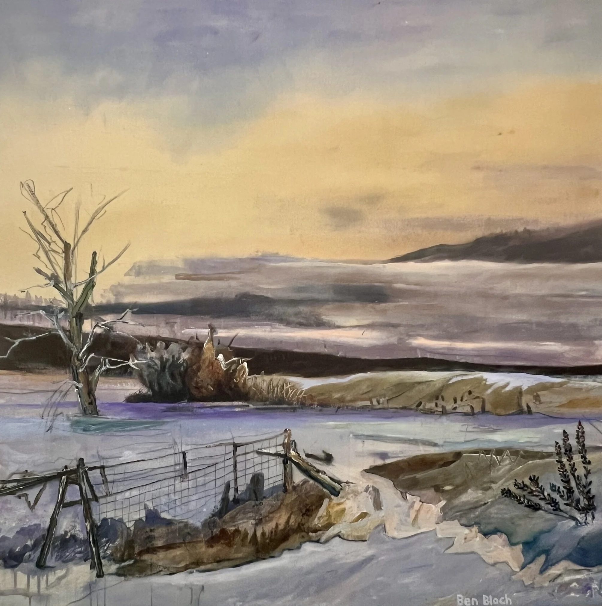 Snowy field with a jack fence