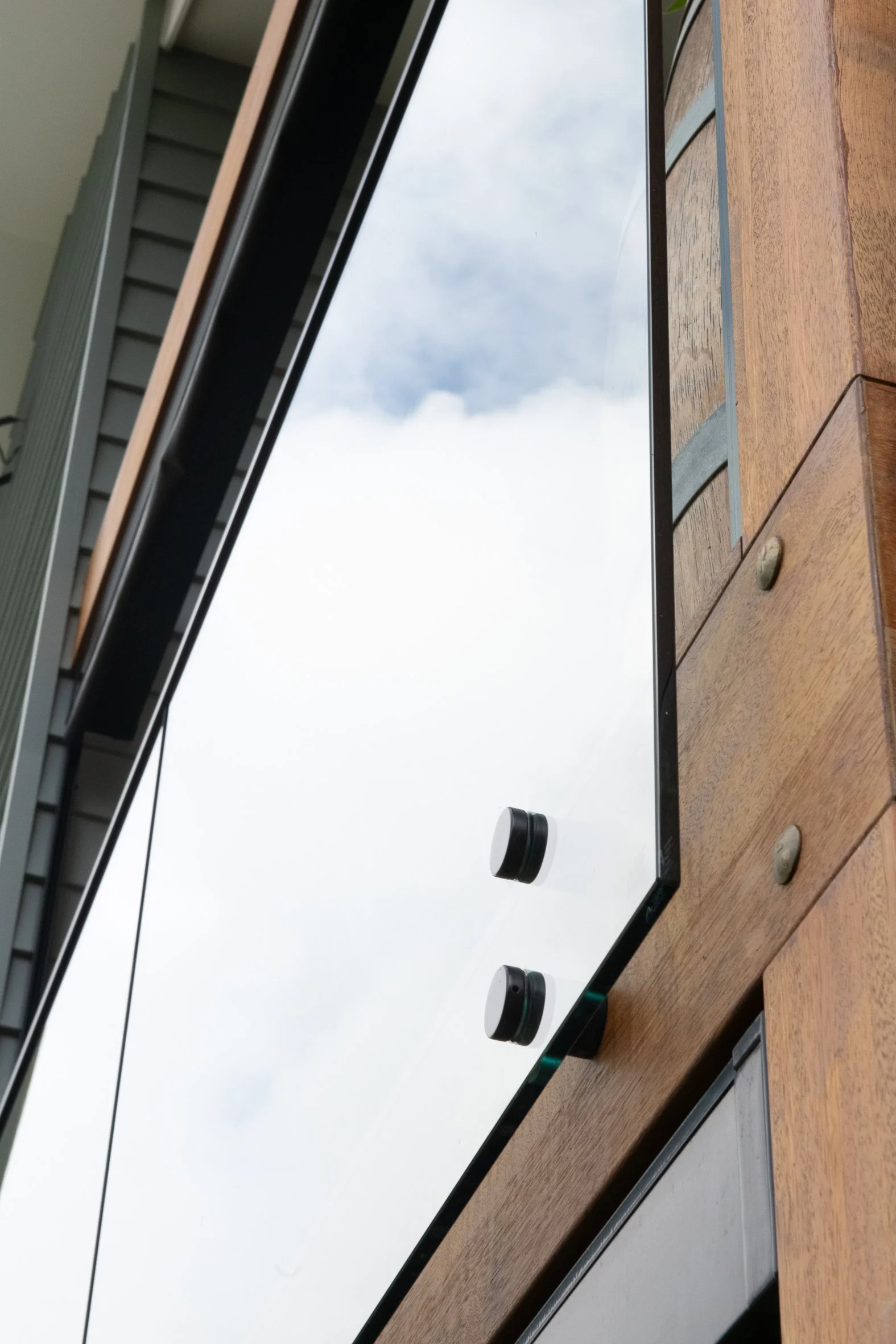 Second storey balcony with glass balustrade renovation Yallingup  timber and glass