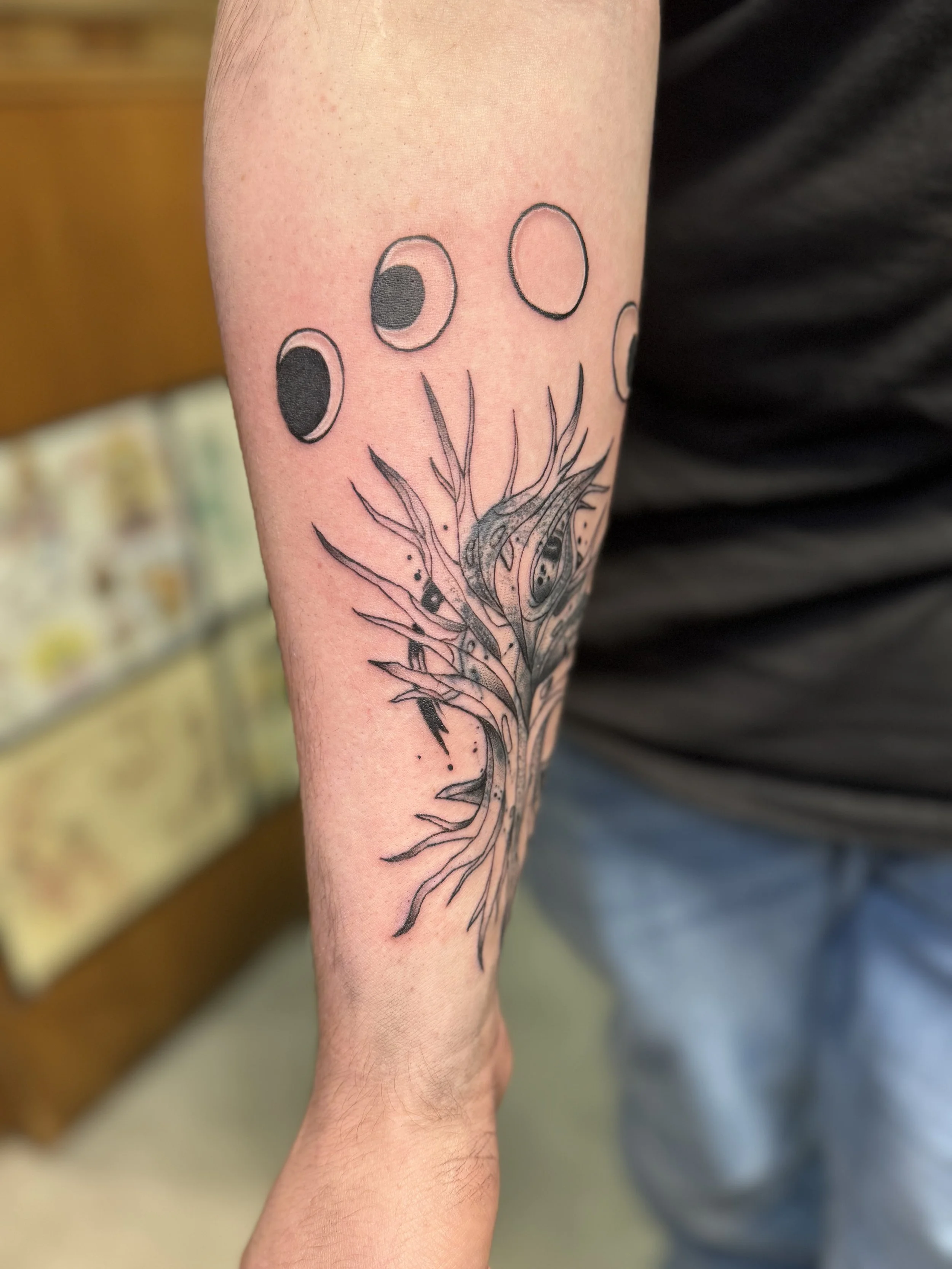 BG bare tree with moon phases cover-up on arm 2.jpg