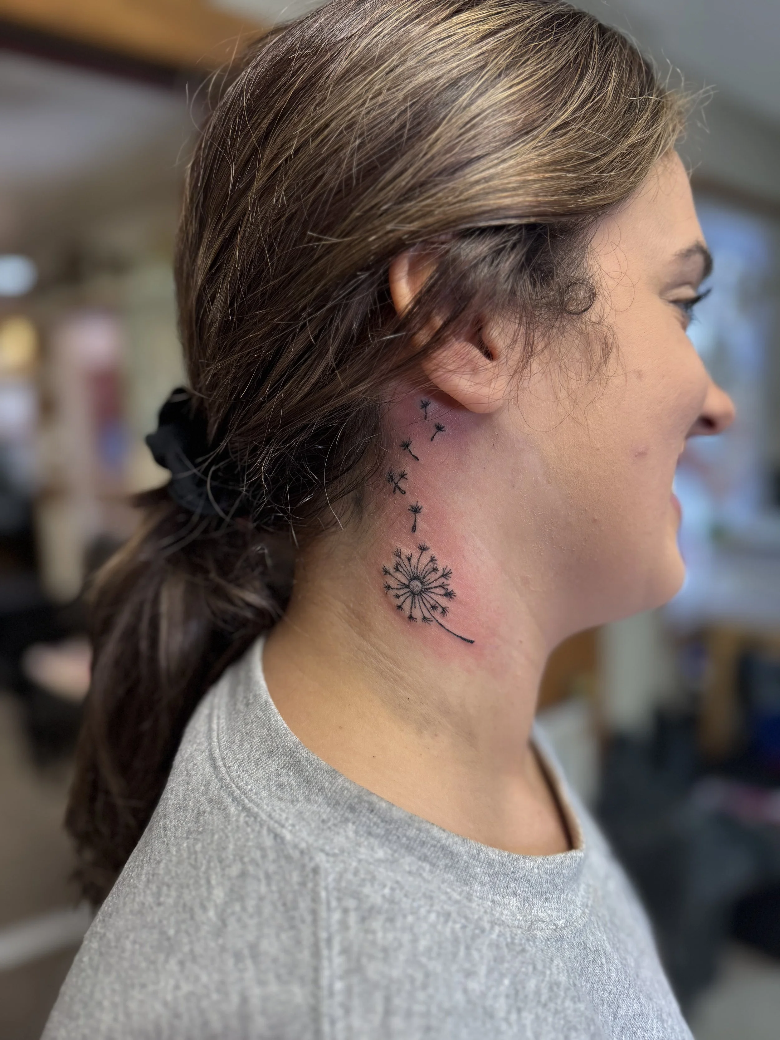 Dandelion on side of neck.jpg