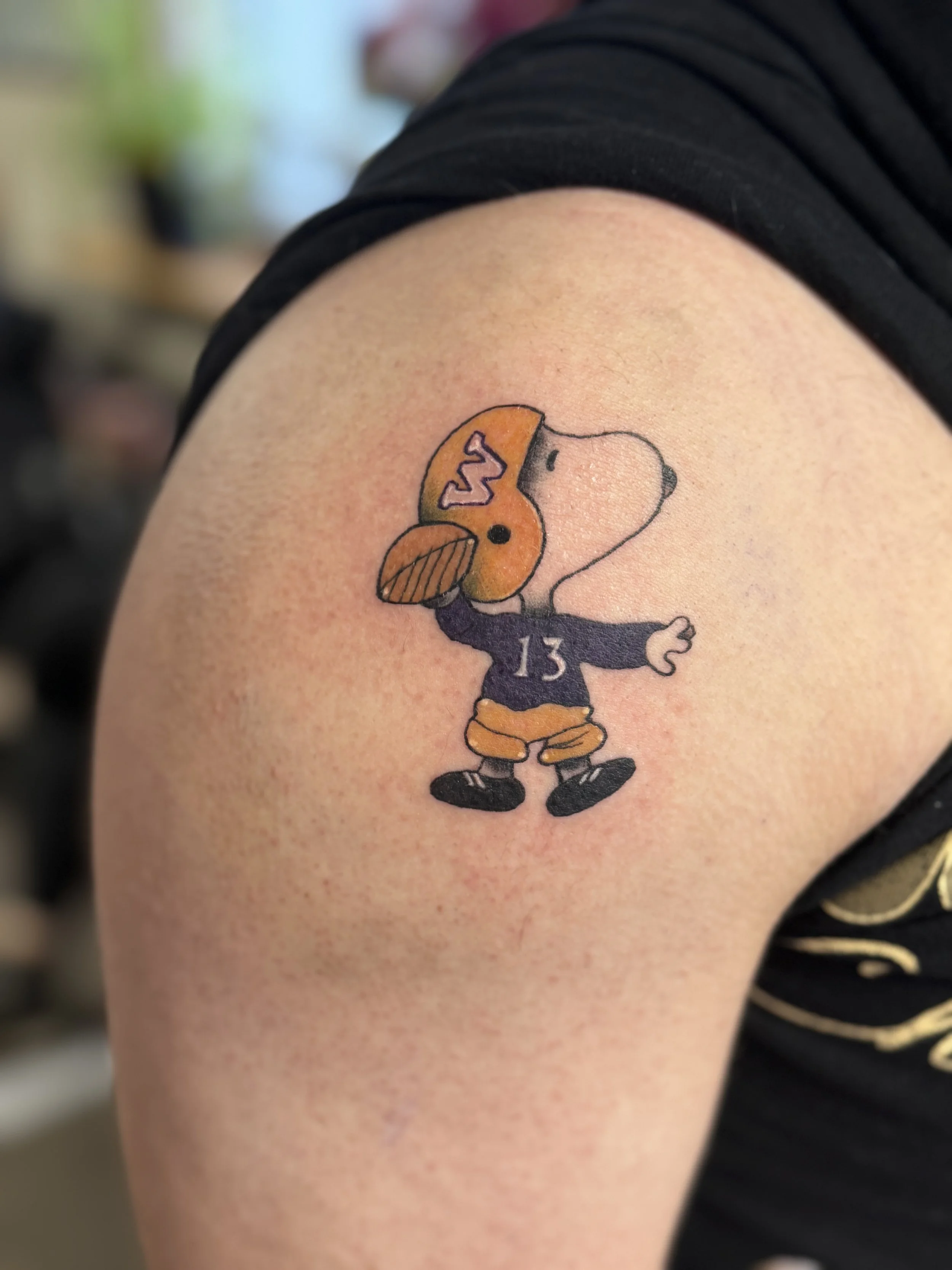 Snoopy throwing football.jpeg