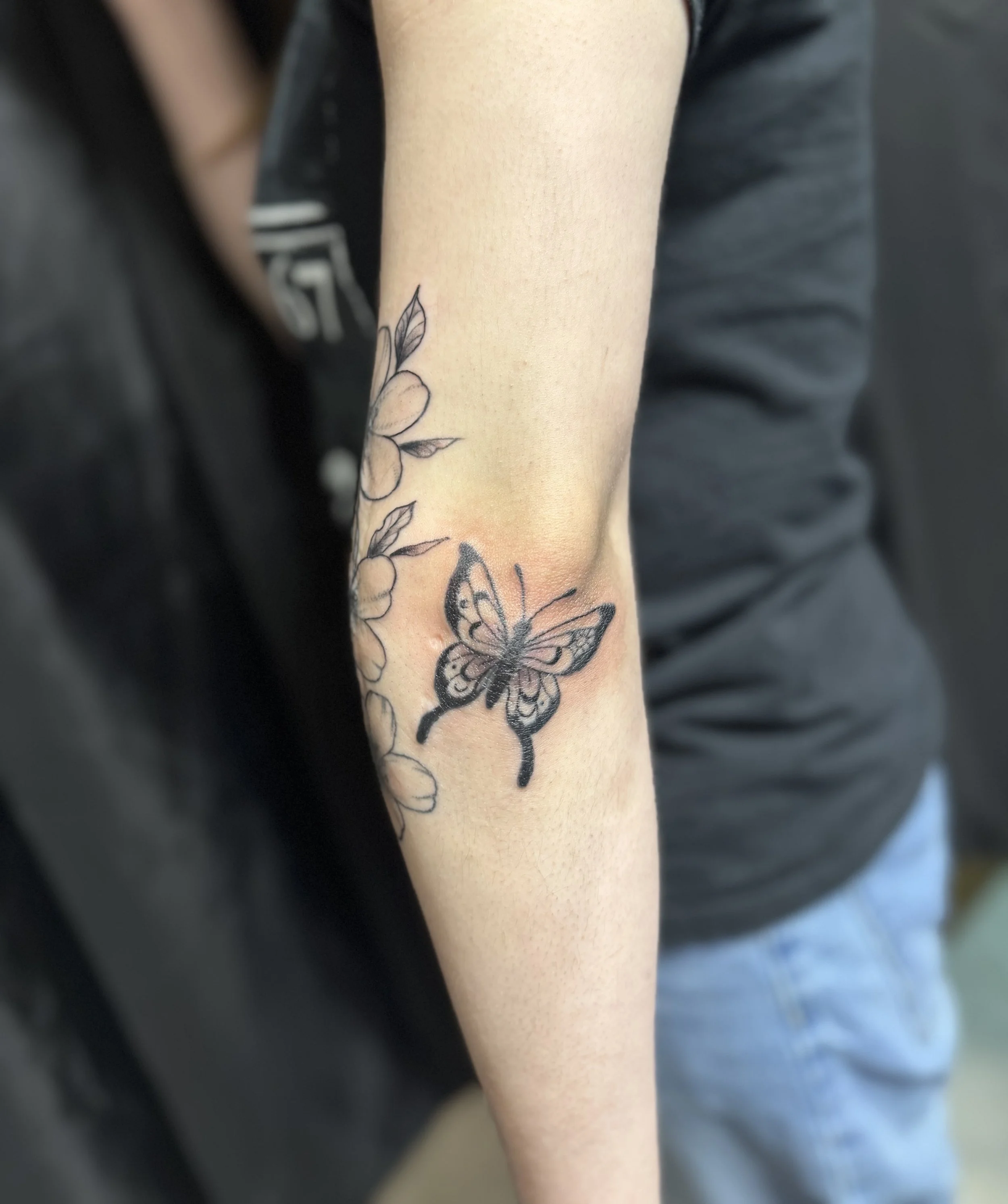 BG cherry blossoms with x2 butterflies on arm 1.jpeg