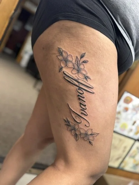 Lettering with plumeria flowers.jpeg