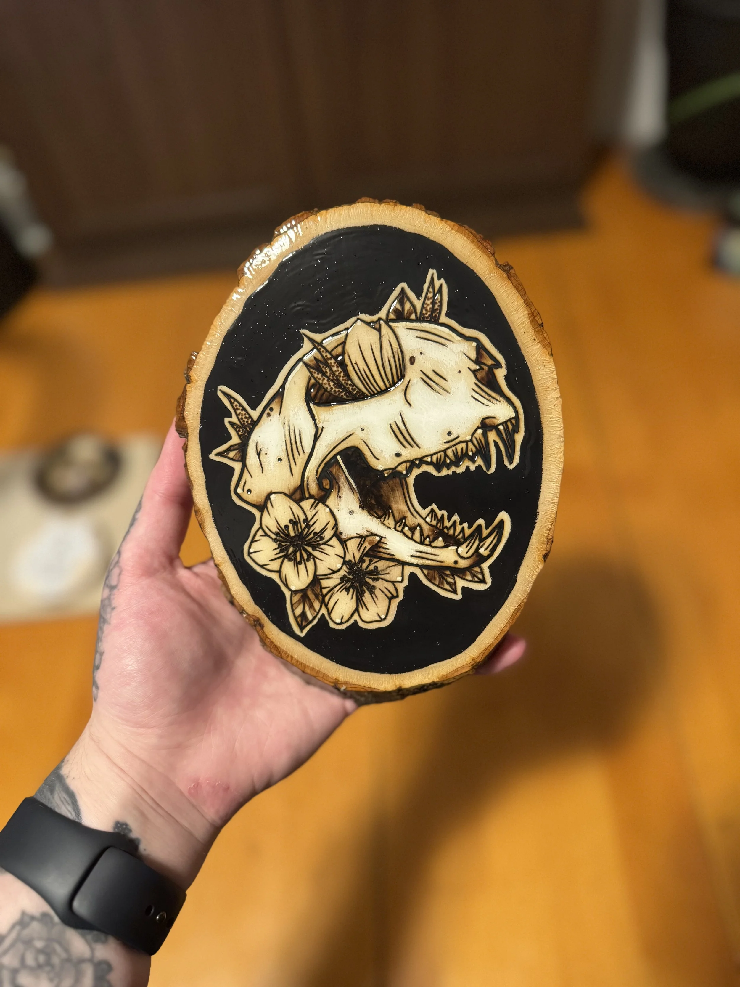 Cat skull with hellbore flowers woodburn art.jpg