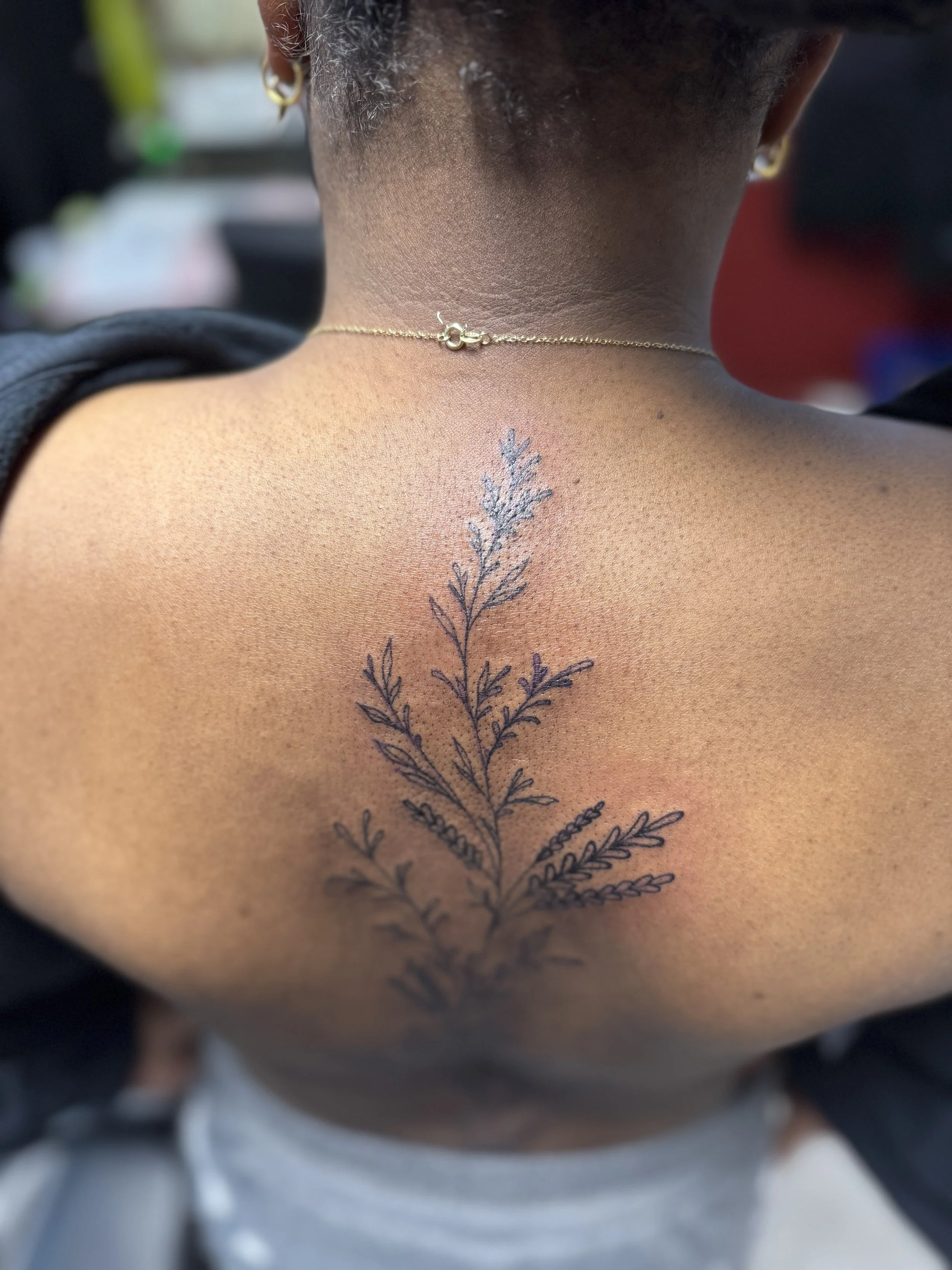 Fine line leafy spine piece 2.jpeg