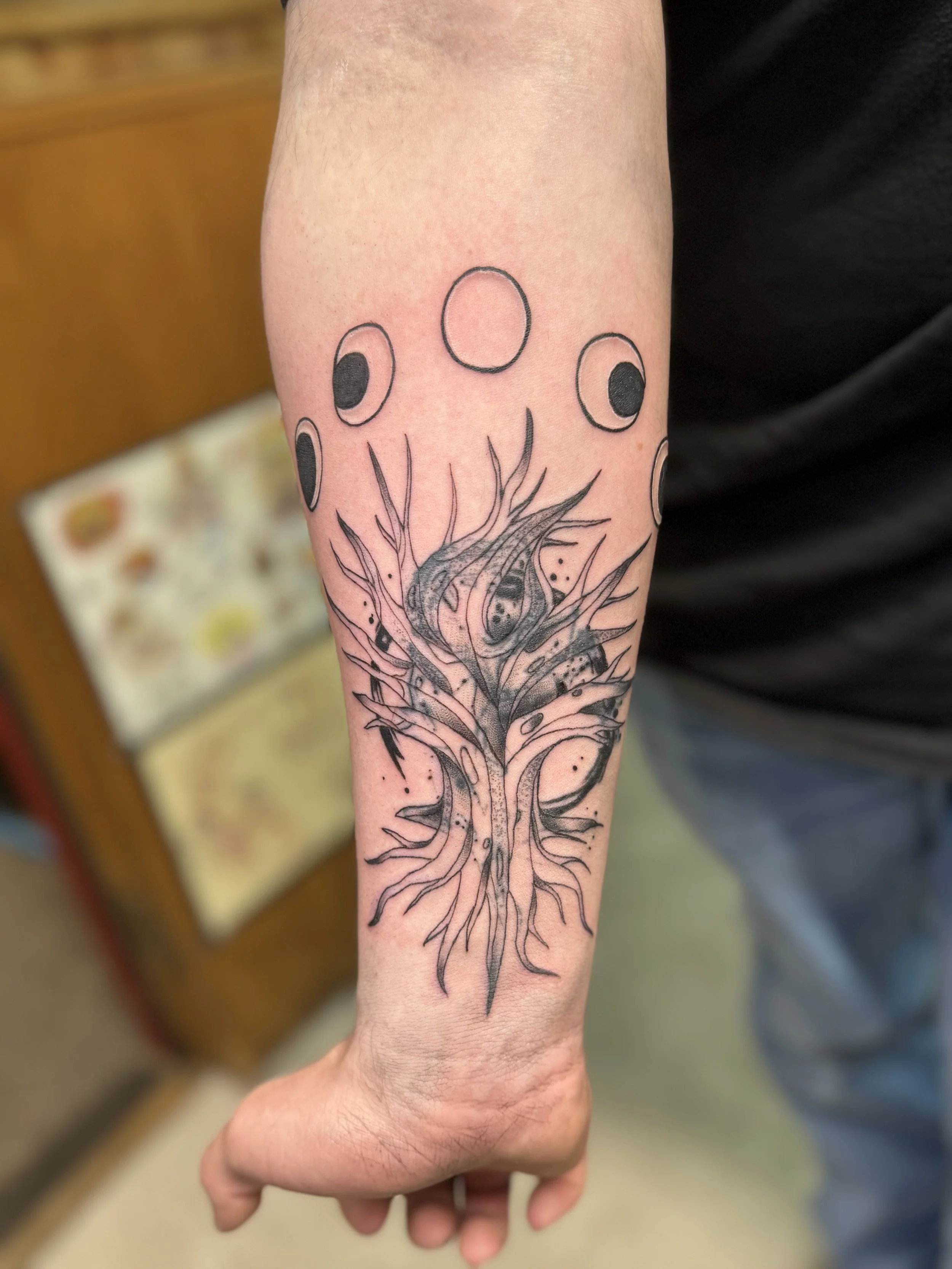 BG bare tree with moon phases cover-up on arm 1.jpg