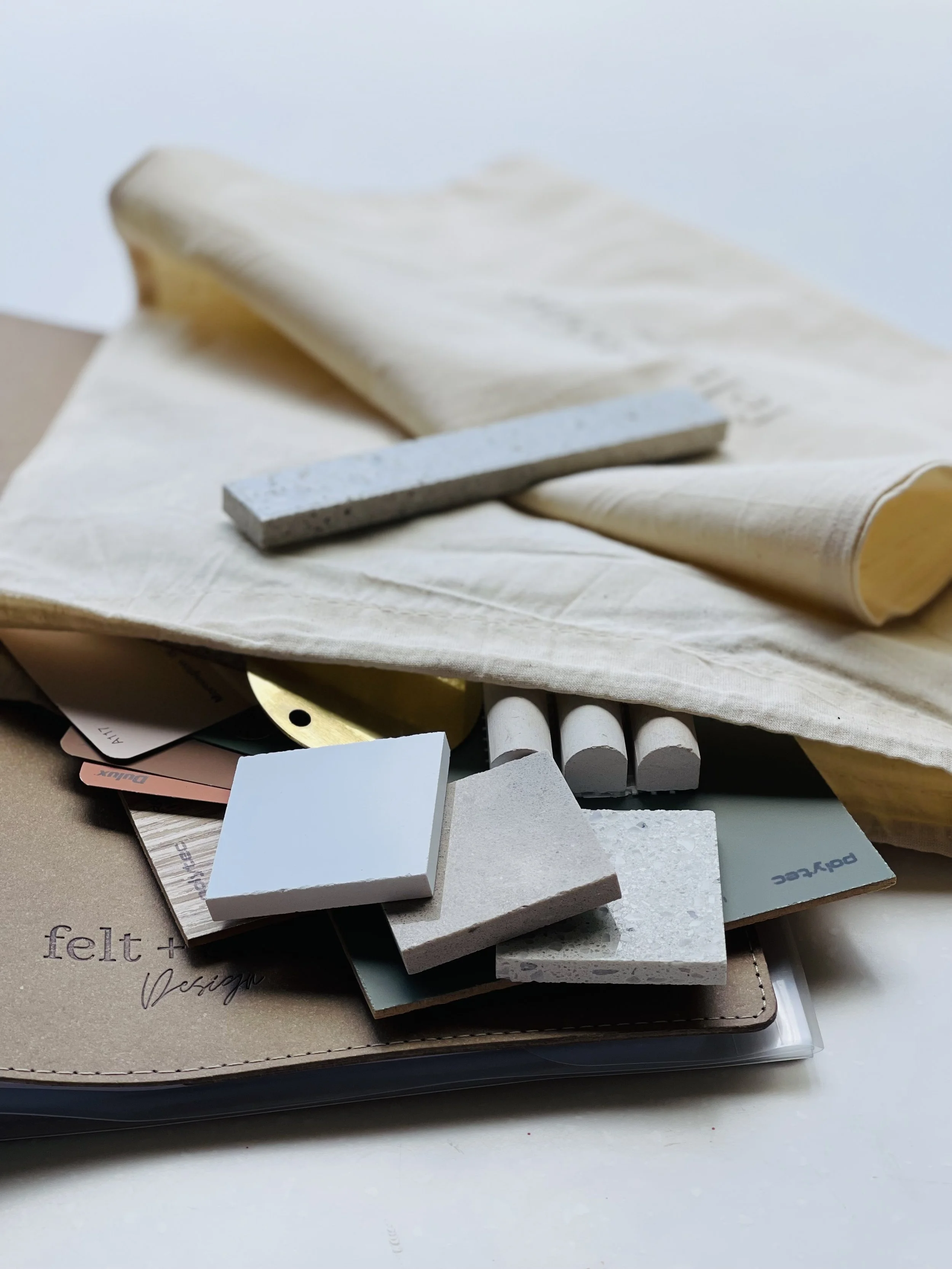 A printed selection schedule in a folder and a section to store your colour samples.