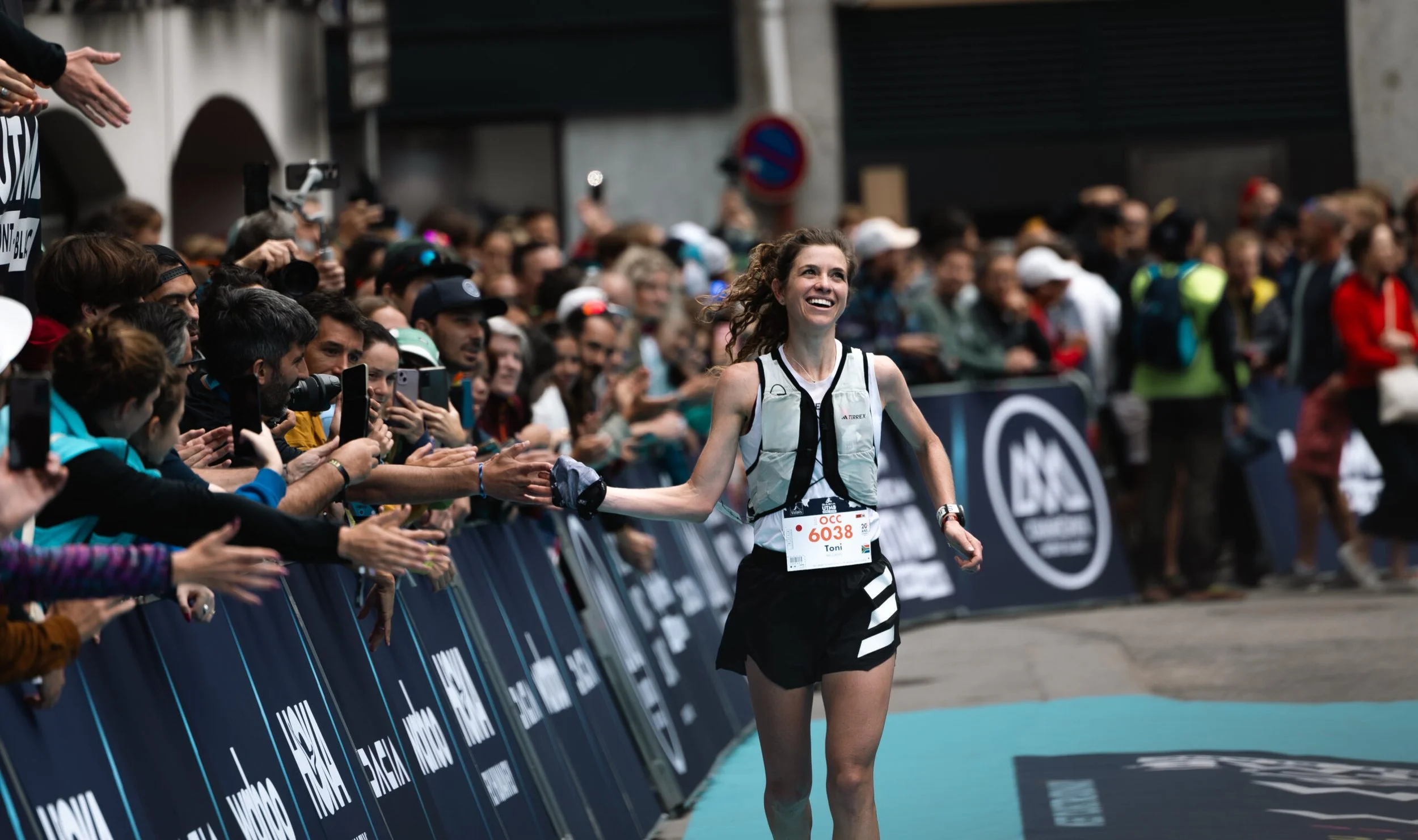 Toni McCann finishing 1st at OCC UTMB trail running race in 2023 as a Flat Rock Athlete. She has since become a trail running coach at Flat Rock. 