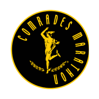 The logo of Comrades Marathon features a black background with a yellow border. It depicts a running person in the center, surrounded by the text "Comrades Marathon" in yellow, arranged in a circular pattern.