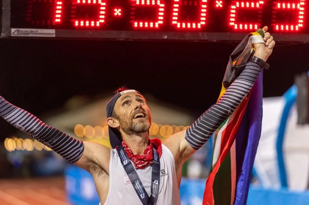 Stuart Mac, the race director of Ultra Trail Cape Town (UTCT), is coached by Erin van Eyssen at Flat Rock Endurance, crosses the Western States Endurance Run finish line in under 20 hours, running a top time in his in that year.