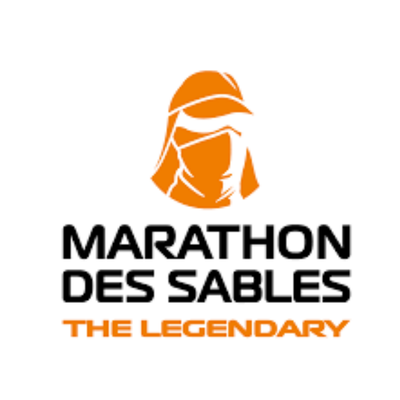 Logo for Marathon des Sables with an illustration of a person wearing a head covering and mask, with the text 'Marathon des Sables' and 'The Legendary' below.