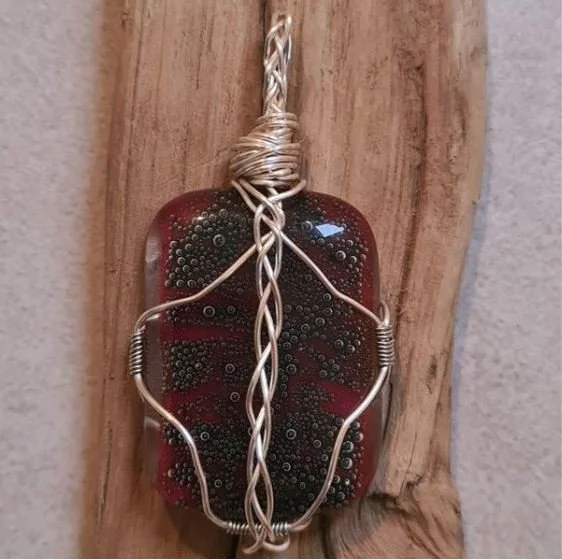 Wire-wrapped bubble fused glass pebble pendant