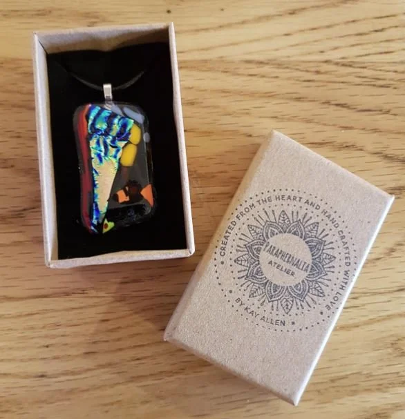 Dichromic fused glass pebble pendant 