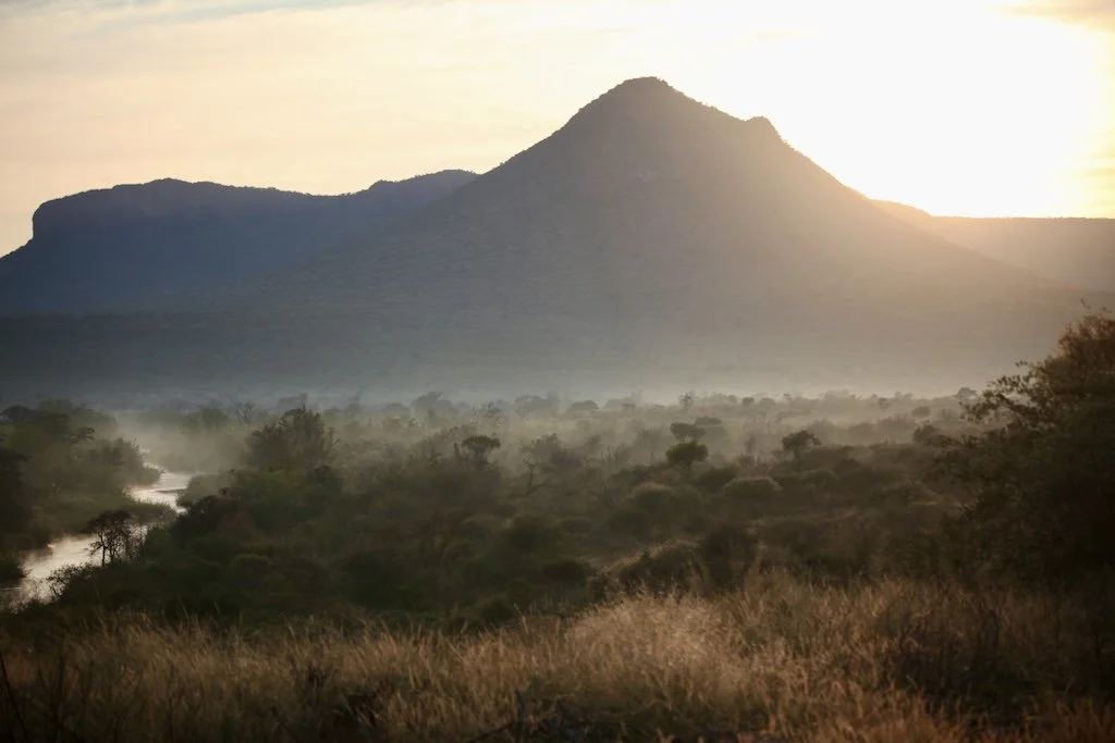 sun rise coming up behind mountains marataba reserve