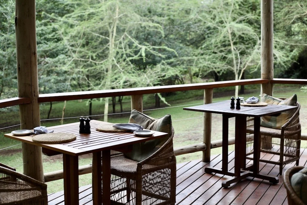 dining on the deck at Rhino River Lodge