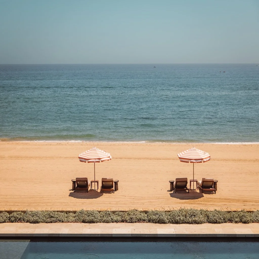sunloungers on the beach at Royal Mansour Tamuda Bay