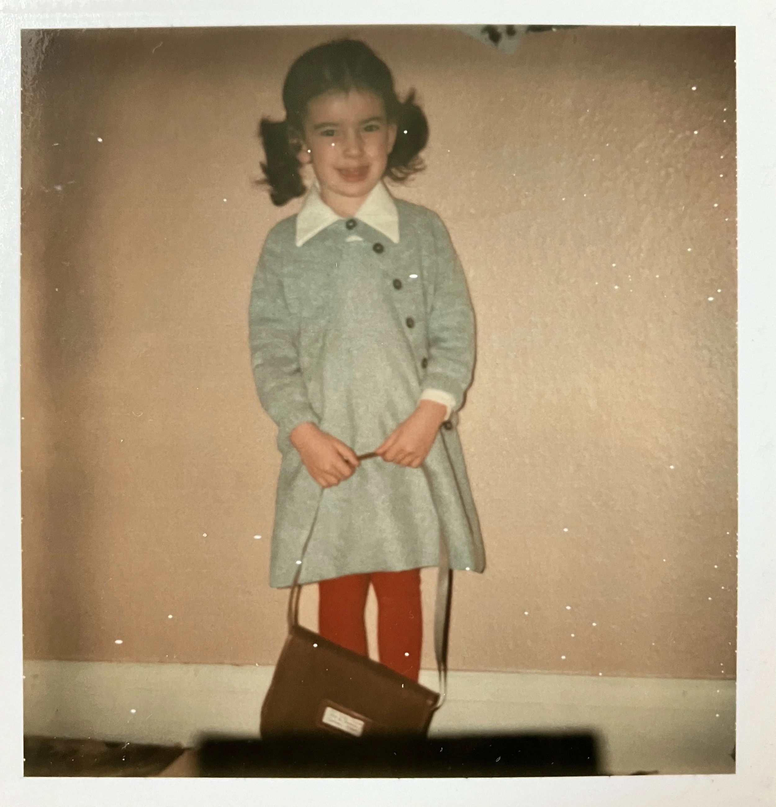 Young girl in red tights