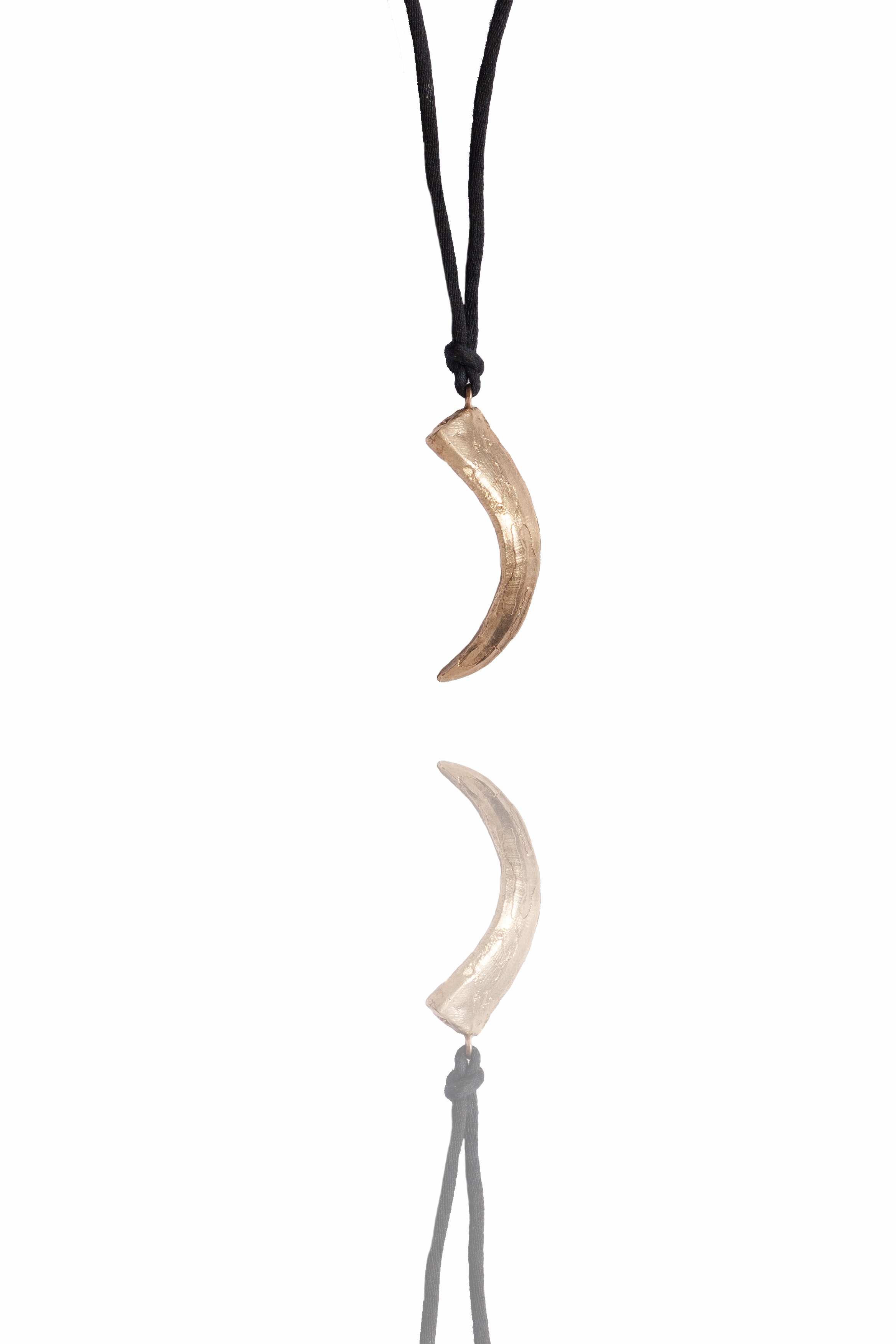 Bronze tusk pendant.png