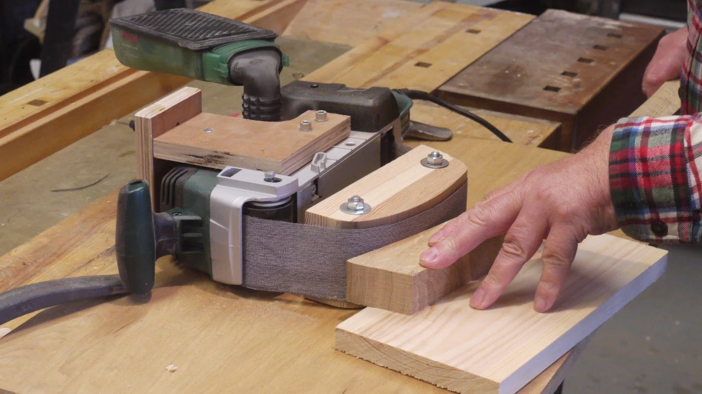 Carpenter Designs Curved Platen to Solve Belt Sander Gouging