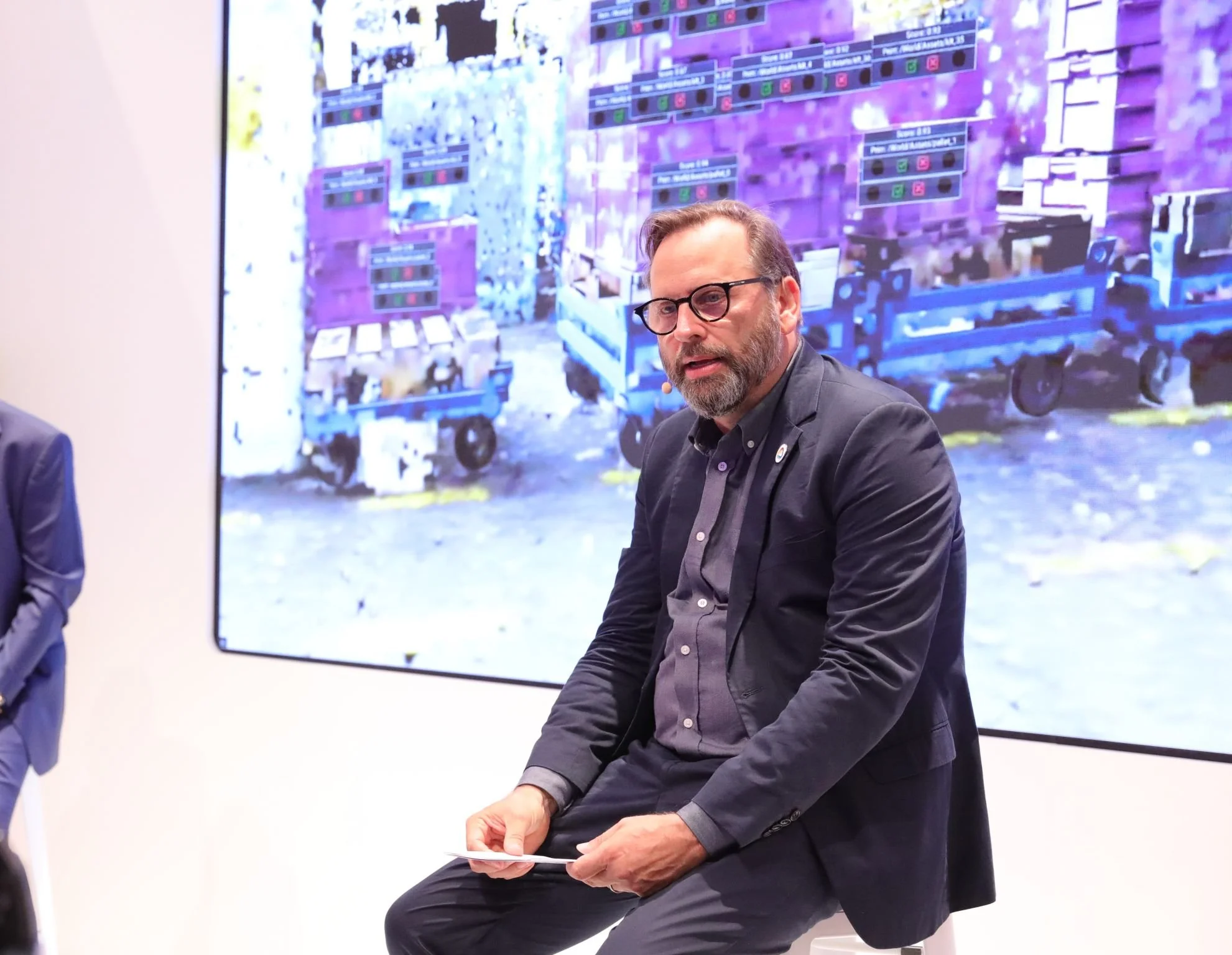 Matthias OEHM (Google Cloud) presenting SORDI.ai's latest point cloud to digital twin reconstruction powered by Google Gemini 