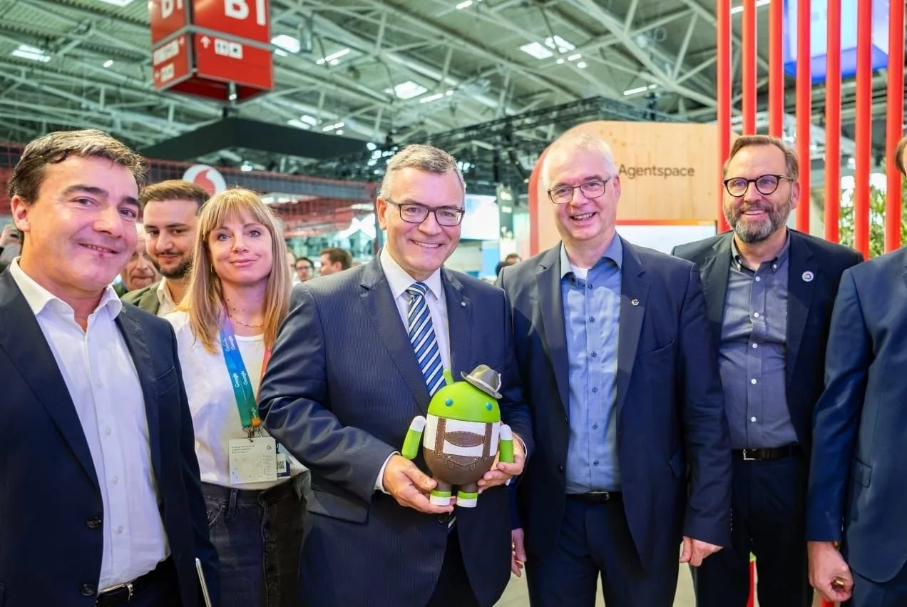 Photo with Dr. Florian HERRMANN, Head of the State Chancellery and Minister of State for Federal Affairs and Media, during his visit to the Google Cloud's SORDI.ai booth at the IAA Mobility 2025 with Google Cloud and SORDI.ai teams